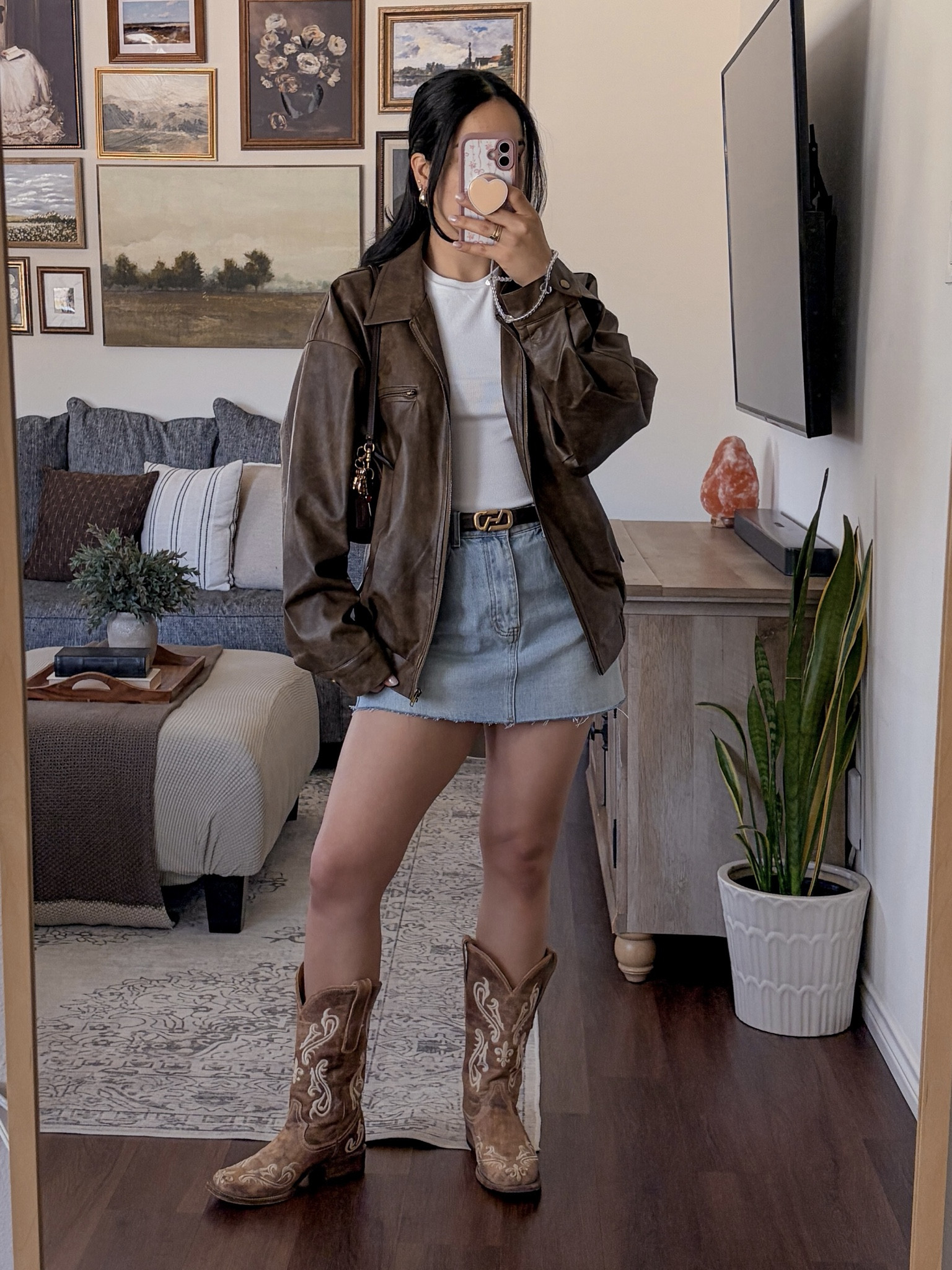houston rodeo outfit inspo 🤠 houston rodeo outfit, rodeo outfit ideas, western outfit inspo, cowgirl outfit, rodeo fashion, country concert outfit, western street style, denim skirt outfit, cowboy boots outfit, graphic tee outfit, oversized jacket outfit, leather shoulder bag outfit, casual western outfit, layered outfit inspo, western chic, modern cowgirl, coastal cowgirl, street style western, effortless style, casual cool outfit, minimal western vibes, spring rodeo outfit, texas rodeo style, rodeo night outfit, festival western outfit, outdoor concert outfit, outfit inspo, ootd, style inspo, fashion inspo 2026, trending outfits, everyday style, boots and skirt combo, denim and boots, western layering, statement jacket outfit, casual cowgirl look  

 #LTKFestival #LTKgrwm #LTKootd