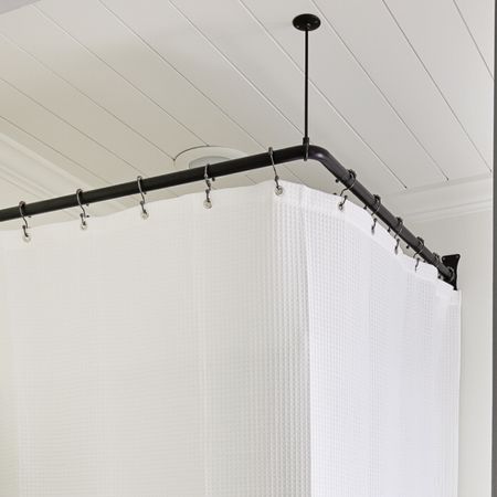 Corner shower rod to hide my outdated shower surround!

White waffle weave shower curtain 72x84 amazon 

Rust resistant metal double shower hooks amazon 

Corner shower curtain rod 36x36 black finish amazon 

#LTKhome