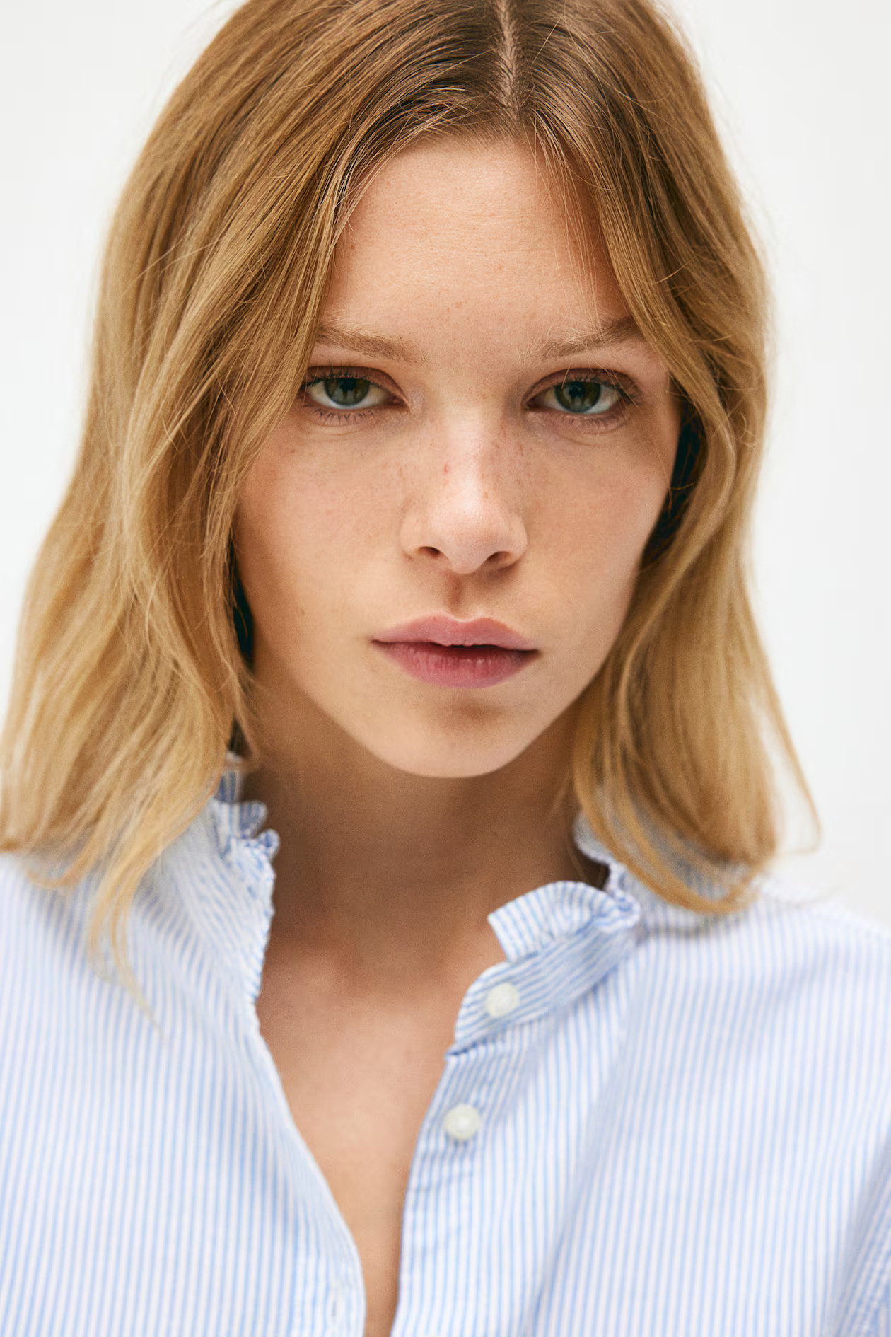 Ruffle-trimmed Oxford Blouse - Long sleeve - Regular length - Light blue/striped - Ladies | H&M U... | H&M (US + CA)