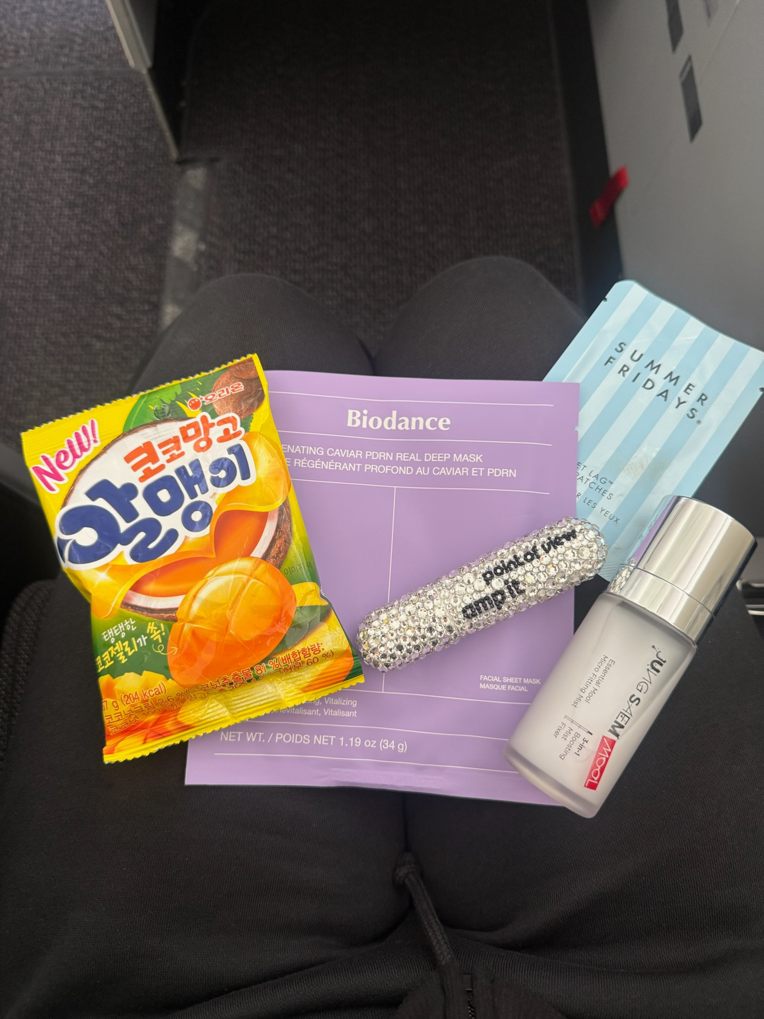 Plane necessities 💜😊

#LTKTravel #LTKgrwm #LTKdayinmylife