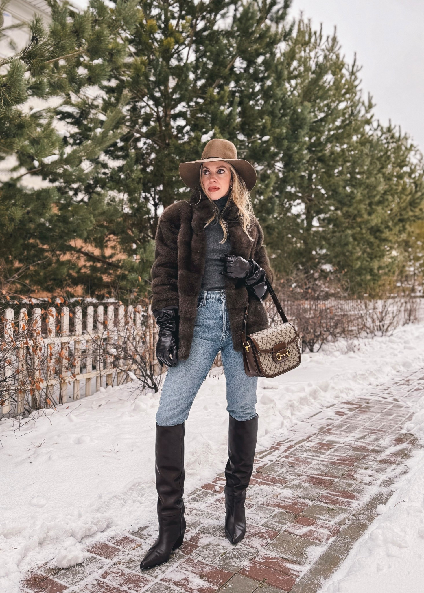 Fur coat with jeans outfit, brown fur coat, long brown leather gloves, skinny jeans with tall boots, Paris Texas dark vein western boots, Gucci bag 

#LTKFindsUnder100 #LTKOver40 #LTKSeasonal