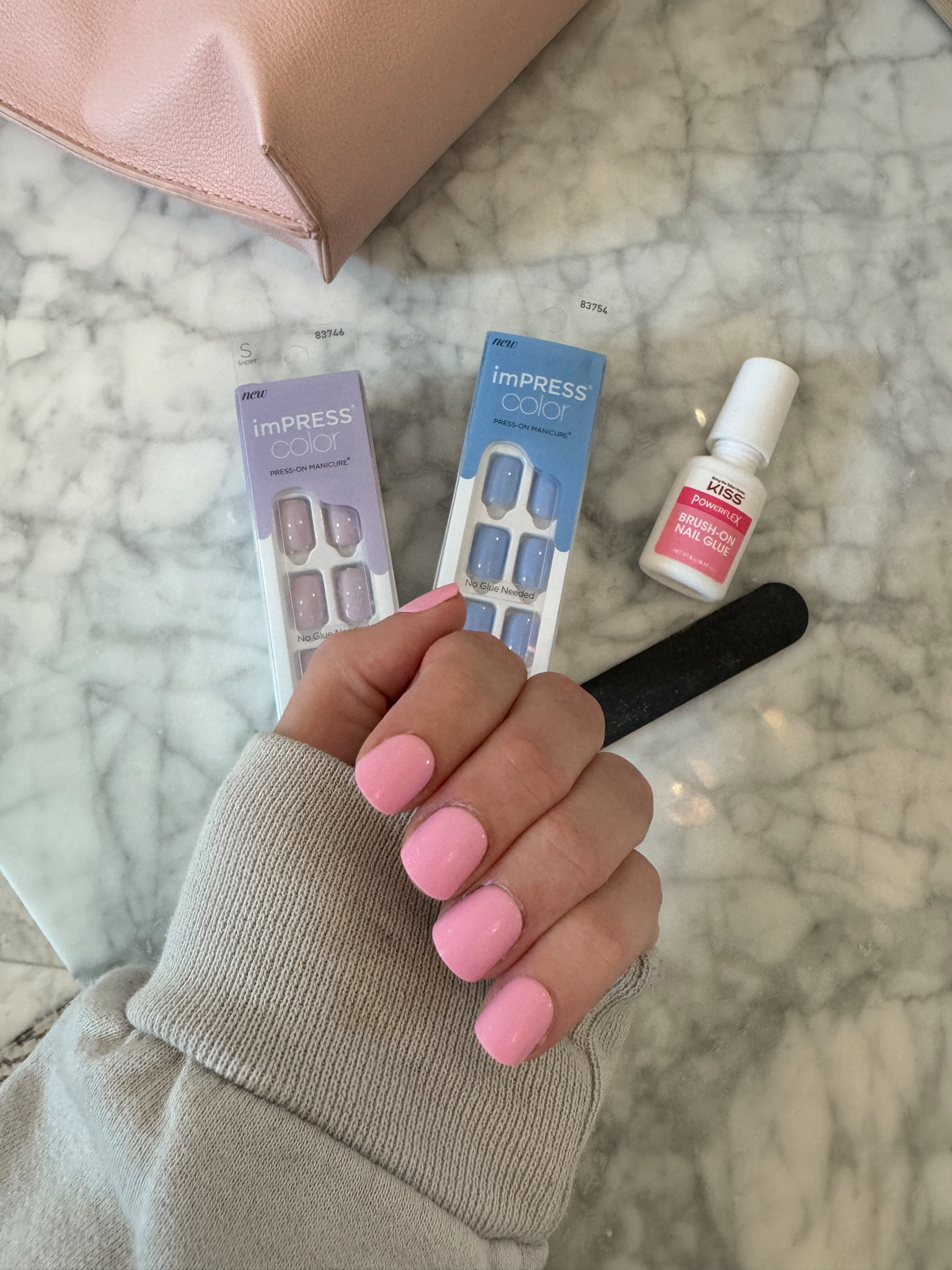 The easiest at home manicure. Press on nails and brush on nail glue. 

#LTKBeauty