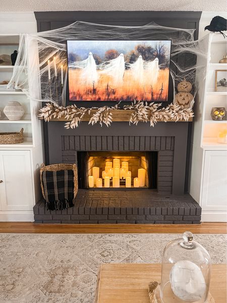 Halloween Living Room, fireplace and mantle  

#LTKhome #LTKHalloween #LTKHoliday