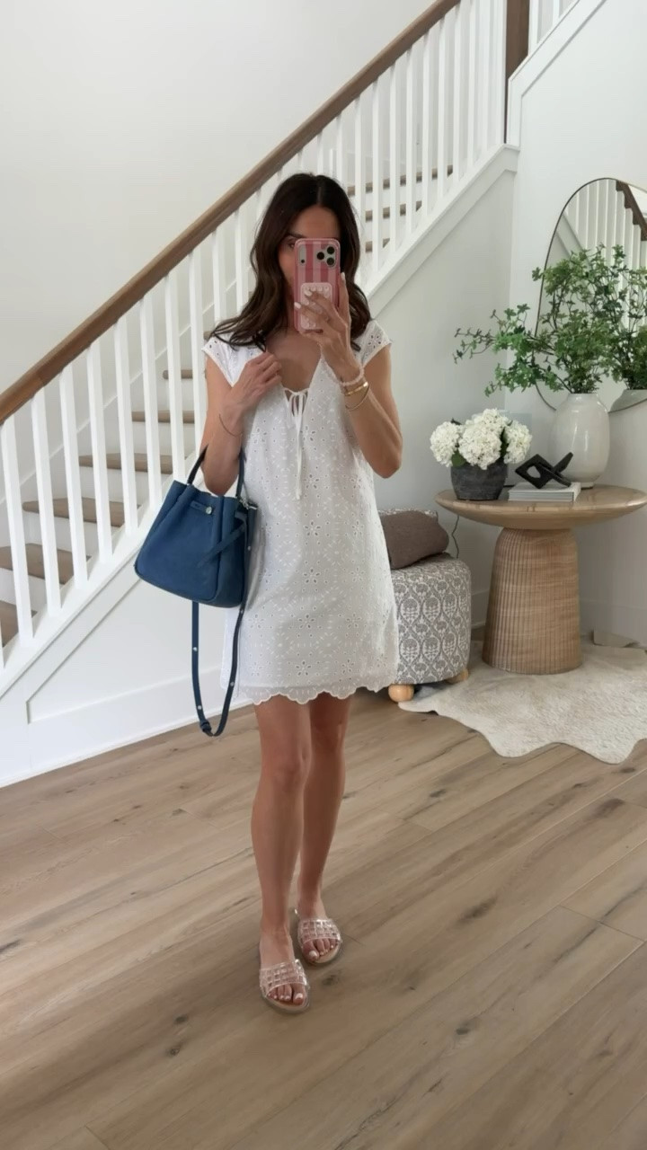 This white eyelet dress is the kind of piece you’ll reach for all summer long. Lightweight, effortless, and easy to dress up or down, it works just as well for vacation as it does for brunch, showers, or everyday summer plans. The blue handbag adds the perfect pop of color.

White eyelet dress, summer dress, vacation outfit, beach vacation style, resort wear, brunch outfit, casual chic style, summer wardrobe, lightweight dress, feminine fashion, warm weather outfit, annabrstyle

#LTKootd #LTKOver40 #LTKSeasonal