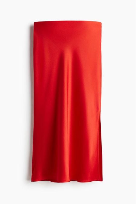 Red satin midi skirt 

#LTKSeasonal #LTKstyletip #LTKfindsunder50