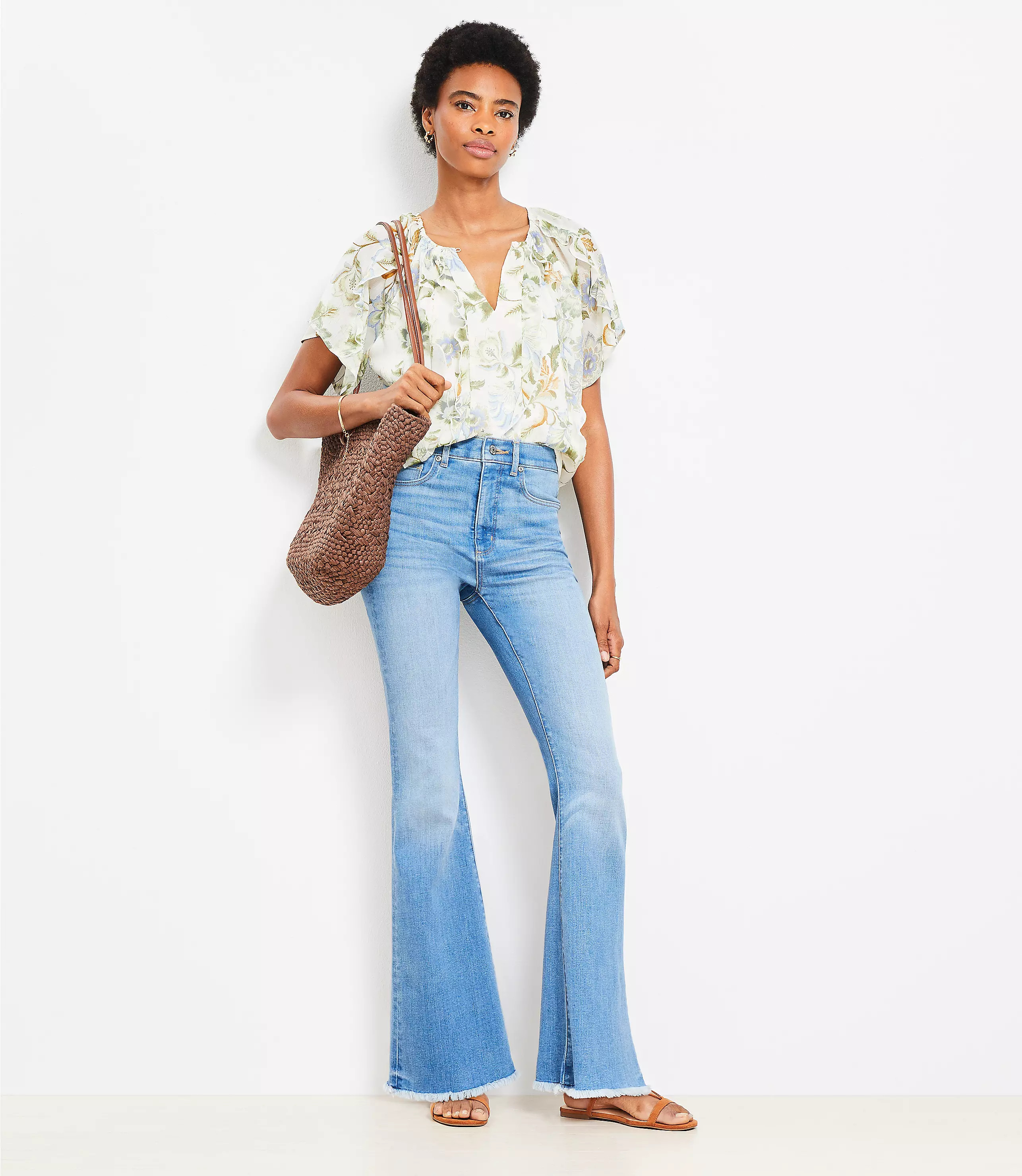 Frayed High Rise Slim Flare Jeans in Classic Mid Wash | LOFT