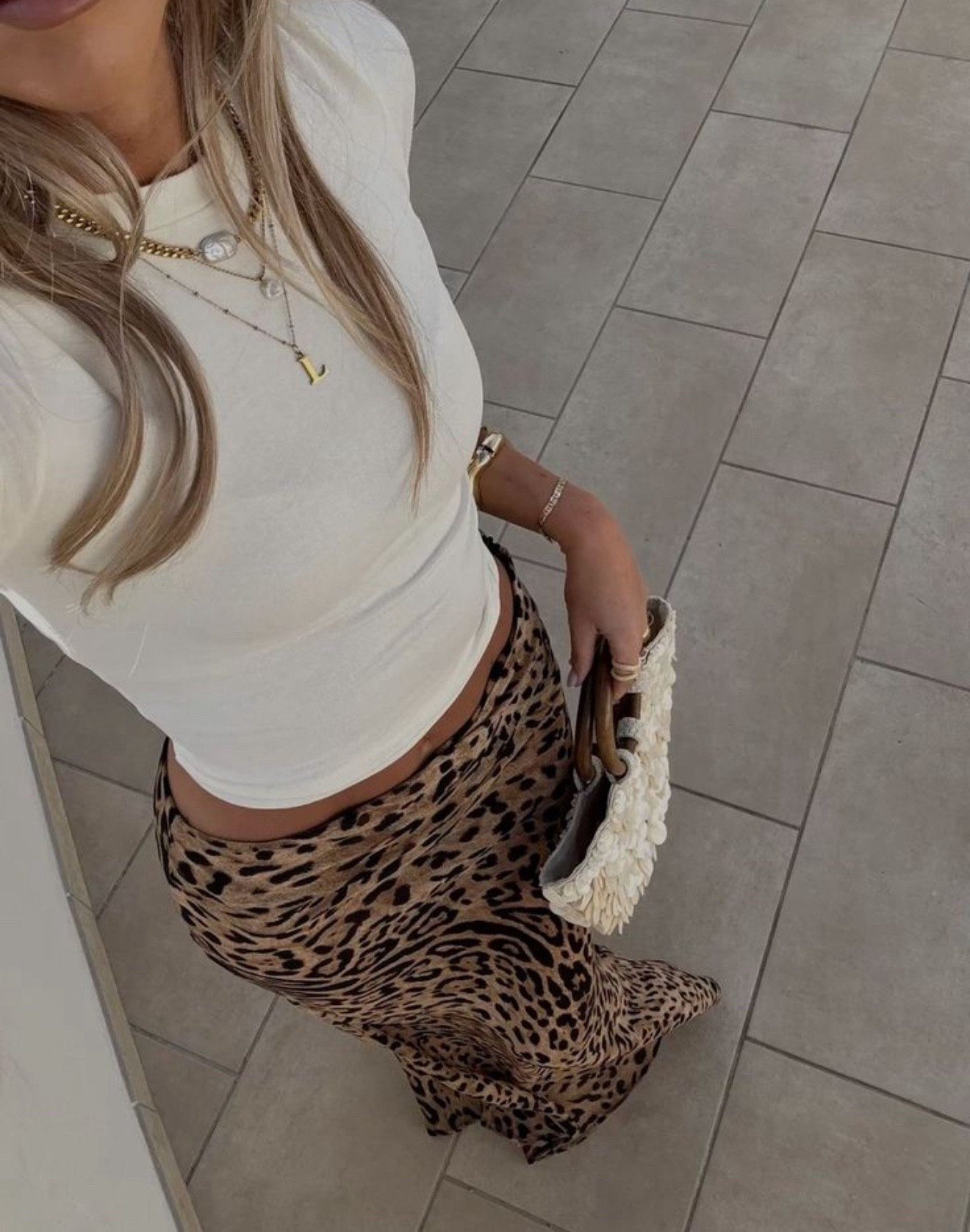 White tee with cheetah print long skirt. Fall fashion. Outfit inspo. Back to school outfit. Dinner outfit. Midi skirt outfit. Affordable fashion. Amazon fashion finds. Brown and white outfit. Casual outfit. Gold jewelry. 

#LTKStyleTip #LTKTravel #LTKFindsUnder50