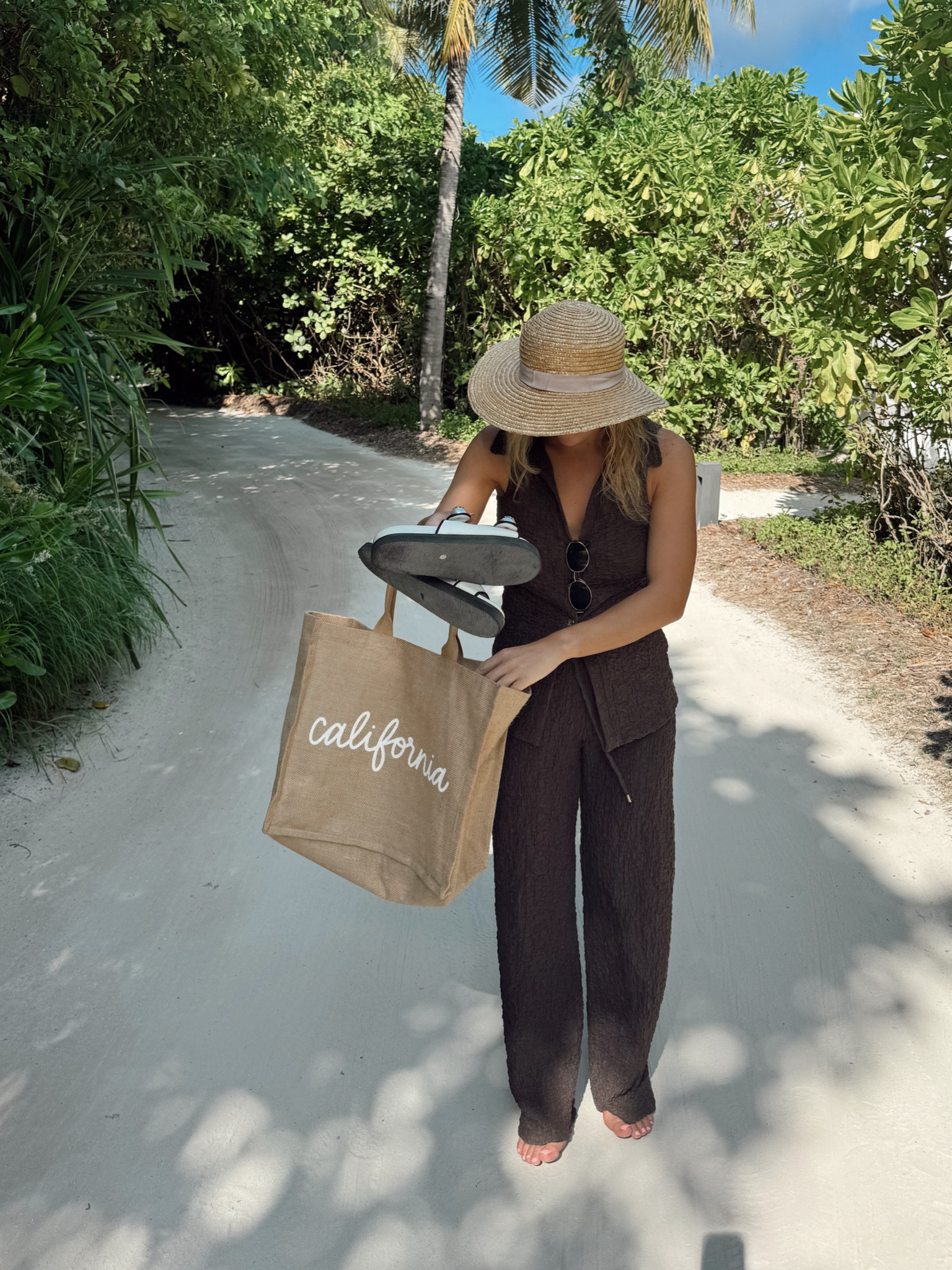 Two piece - beach two piece - beach trousers - Co ord - co-ord - brown co-ord - waistcoat - waistcoat outfit - beach hat - beach outfit - wide leg pants - airport outfit - travel outfit - flight outfit 

#LTKstyletip #LTKtravel