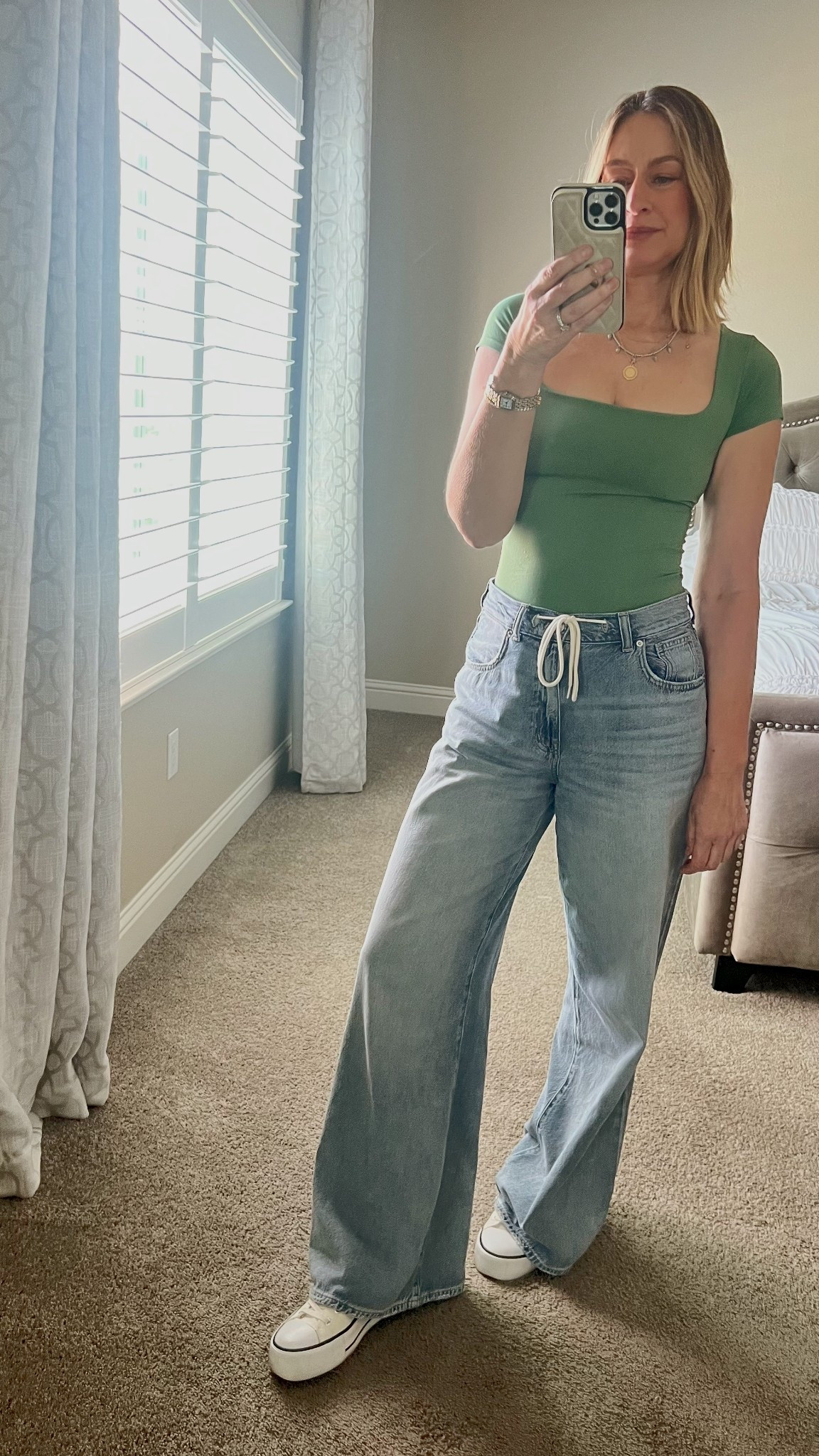 Outfit of the day 💚 Top is Free People wearing a XS/S. Jeans are Madewell but are currently sold out. Linking similar options. 

#outfit #casualstyle #style #whatiwore

#LTKootd #LTKOver40 #LTKSaleAlert