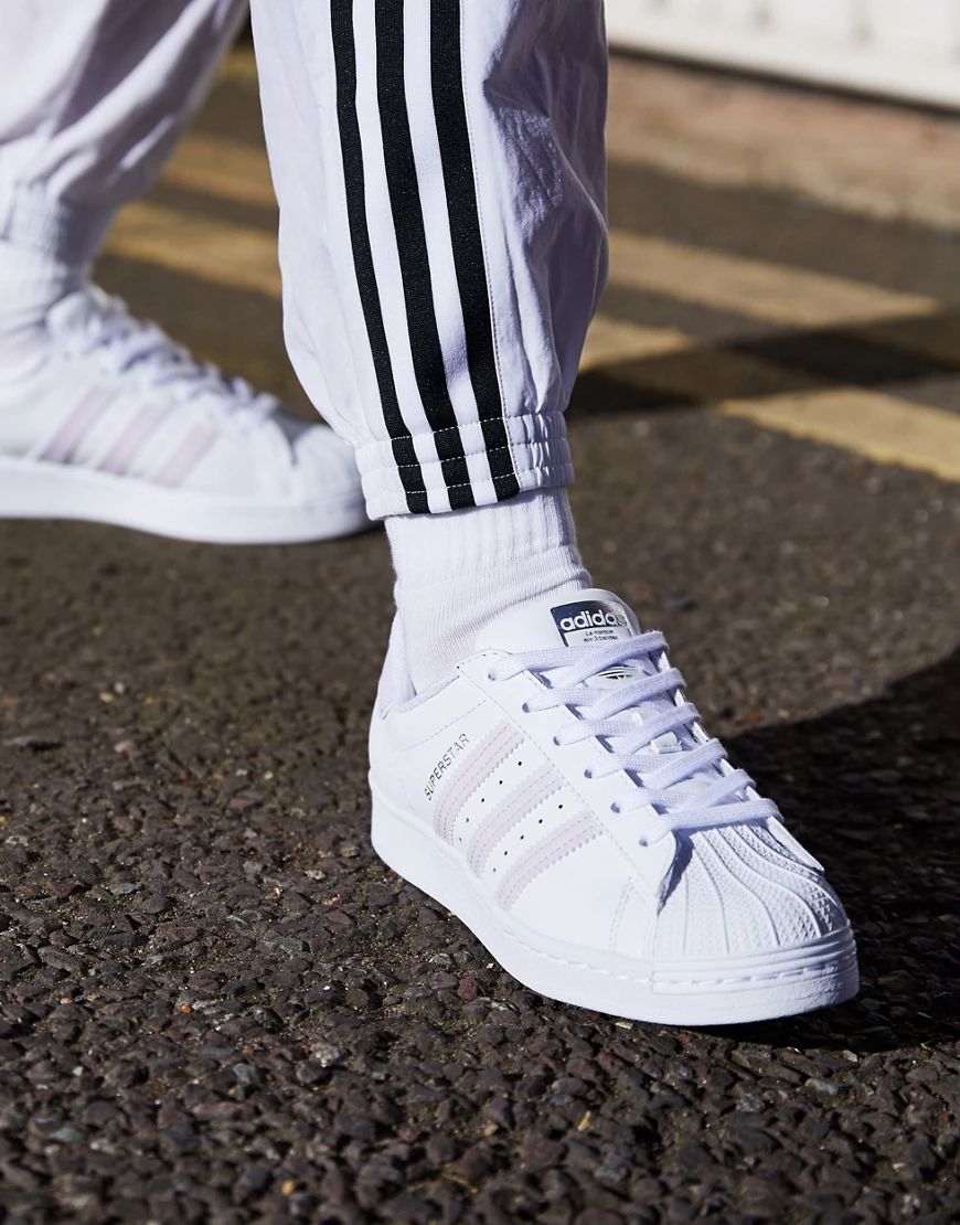 adidas Originals International Womens Day Superstar sneakers in white and lilac | ASOS (Global)