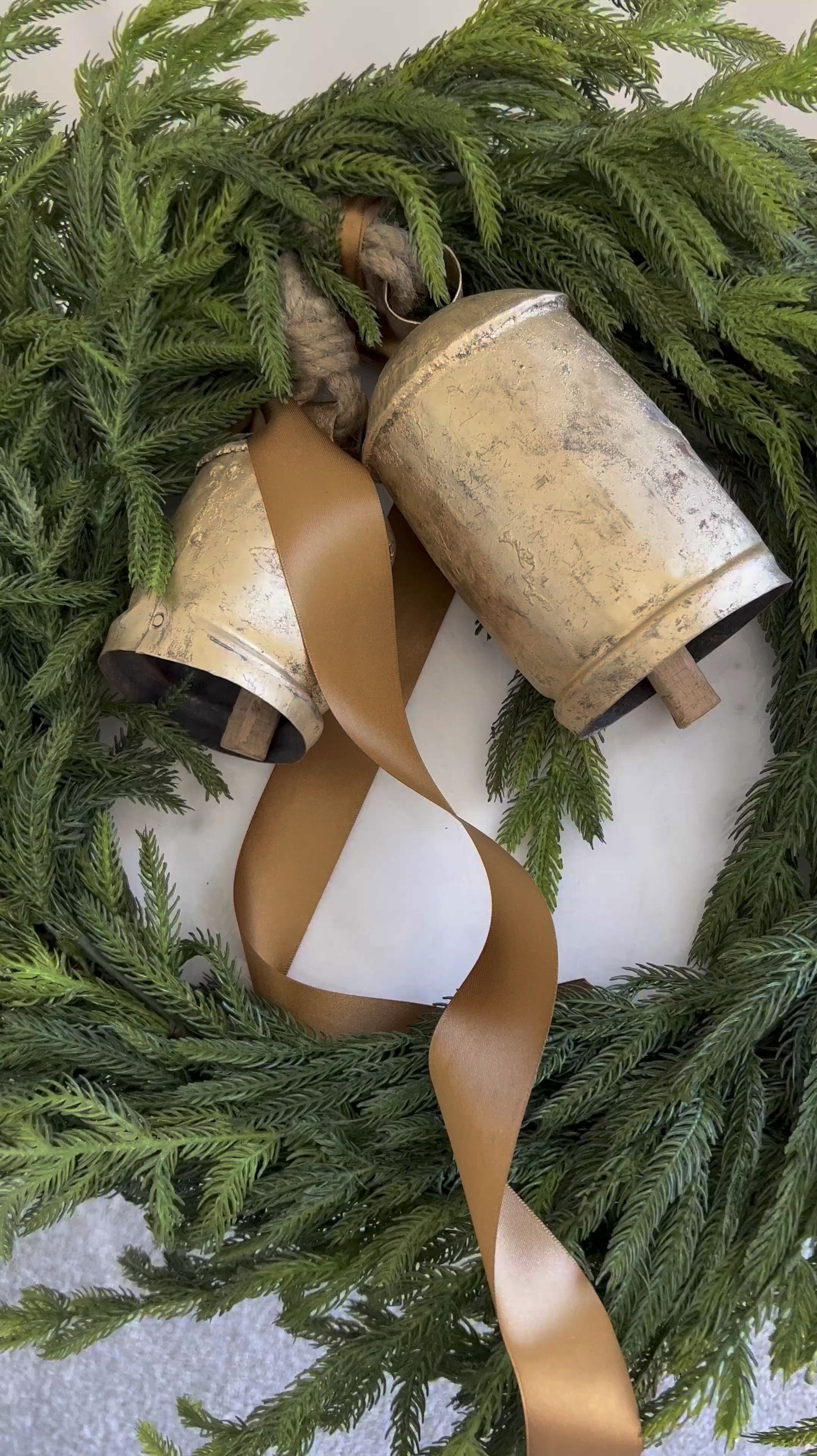 I couldn't resist the trend ,  adding two charming cow bells and a touch of ribbon to this lifelike wreath – it's now got that extra flair! 🌟💕 Curious to see how it transformed my space? Tap the link below and let's ring in some joy together! 🔔

#LTKStyleTip #LTKSaleAlert #LTKHome