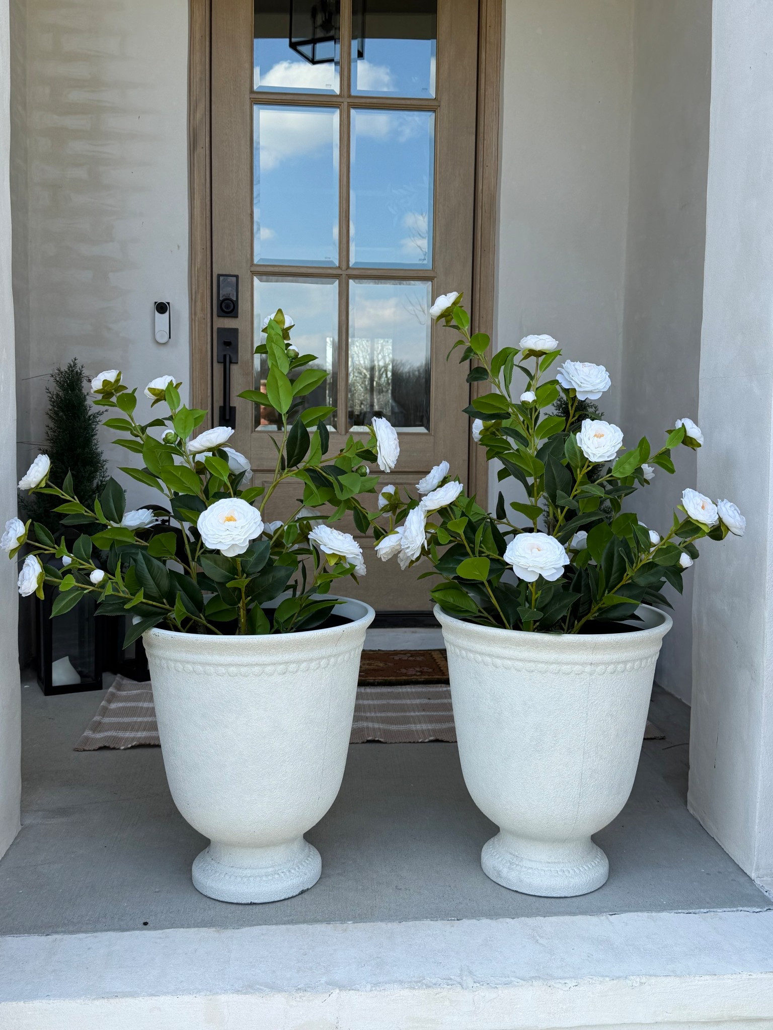 Perfect porch planters & faux flowers to last all season long! 

#LTKSeasonal #LTKHome