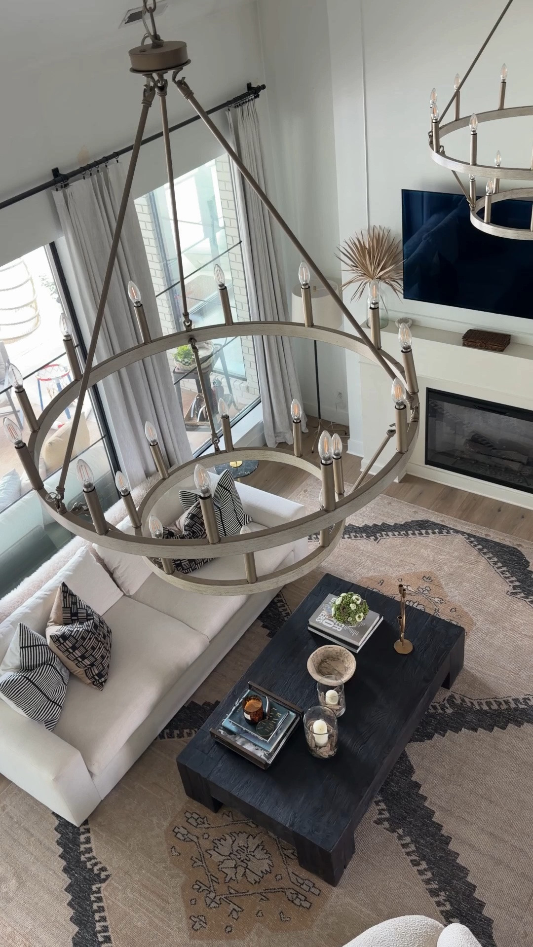 Wagon wheel 20 light dimmable chandelier at an amazing price @Wayfair  living room inspo

#LTKOver40 #LTKHome