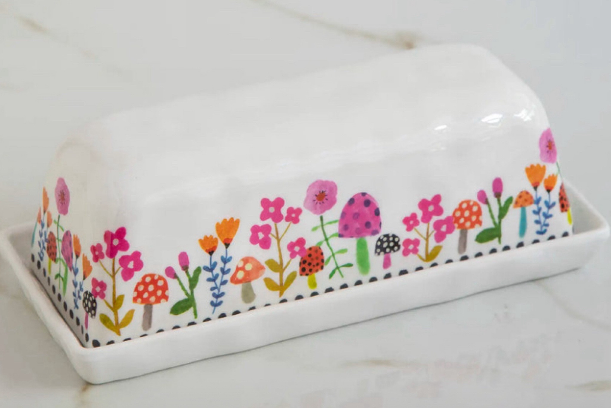 A must-have for free-spirited, busy moms in their 40s who appreciate style in every detail. 🌸🍽️ 

Elevate your kitchen with this charming boho, hippie, floral butter dish from Natural Life.

#BohoMoms #KitchenMagic #NaturalLife #HippieStyle"

#LTKhome #LTKCyberWeek #LTKGiftGuide