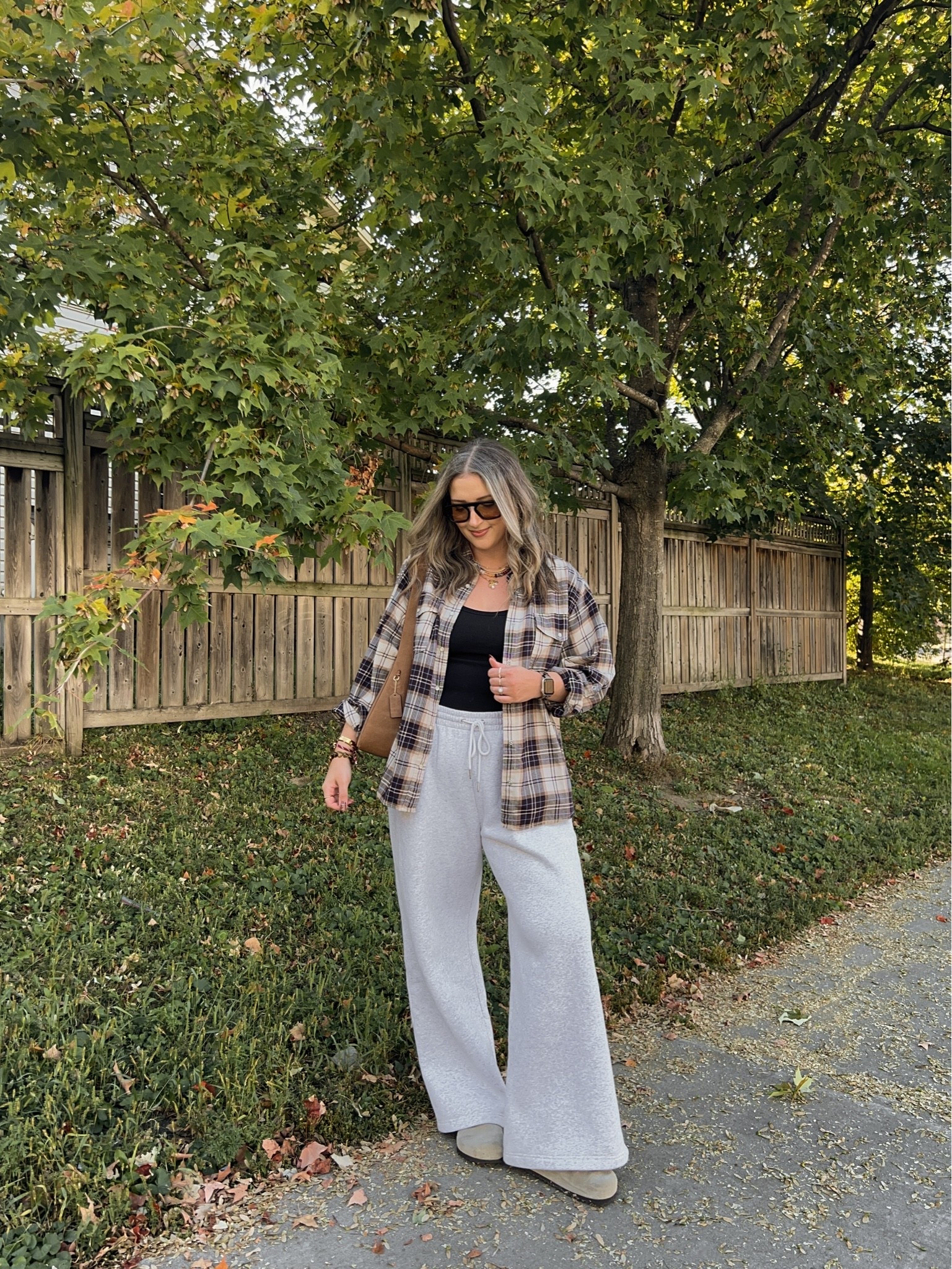 Fall ootd! Wearing M in the bra free tank, L in the wide leg sweatpants (could have done M). Sized up to XL in the plaid flannel shirt for an oversized fit. I’m a 9.5-10 and wear a 40 in the Birkenstock clogs

#LTKfall #LTKsale #LTKstyletip