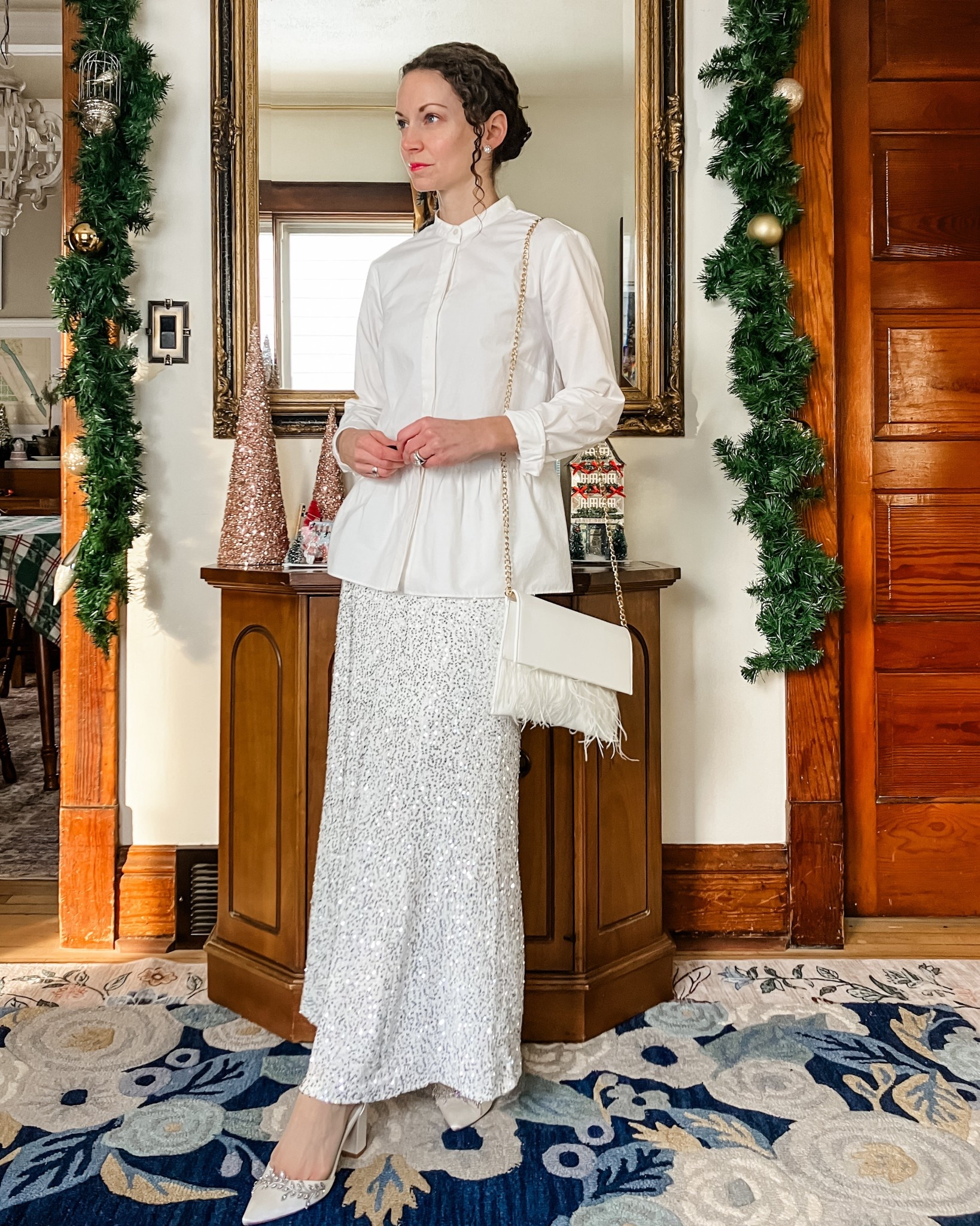 What I wore to my son’s Christmas concert! A classic white button up with a silver sequin skirt, white heels with jewels and a white feather bag. Petite outfit. Modest outfit. Christmas outfit. Holiday outfit  

#LTKootd #LTKmomlife #LTKHoliday