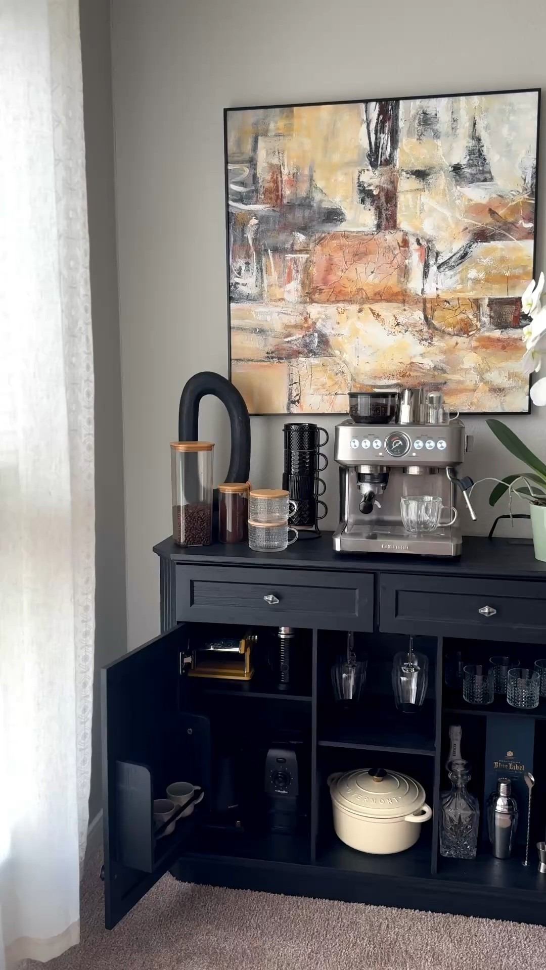 This Amazon buffet cabinet is not just furniture… it’s the heart of my cozy routine.  @amberhaus_home #amberhaus 

I’ve been looking for a piece that feels stylish but also functional, and this buffet cabinet exceeded my expectations.

✔️ Solid & sturdy – It feels strong and stable, not flimsy at all.
✔️ Perfect storage layout – Two drawers for small items, cabinets with shelves inside, plus open middle space for larger pieces.
✔️ Multi-purpose – I’m using it as a coffee bar, but it can easily work as a buffet table, bar cabinet, or entryway storage.
✔️ Beautiful modern look – The dark finish gives such an elegant contrast against neutral walls.
✔️ Compact but spacious – It fits perfectly in smaller spaces while still holding so much inside.

I love how I can store my coffee machine on top, glasses and bottles inside, and keep everything organized but still aesthetic 🤎

If you’re creating a cozy home coffee station or need a stylish storage piece, this is such a great find ✨

Linked in my Amazon storefront 🤎 

#amazon #amazonhomefinds #buffetcabinet #homestyle homefinds

#LTKSaleAlert #LTKHome #LTKmomlife