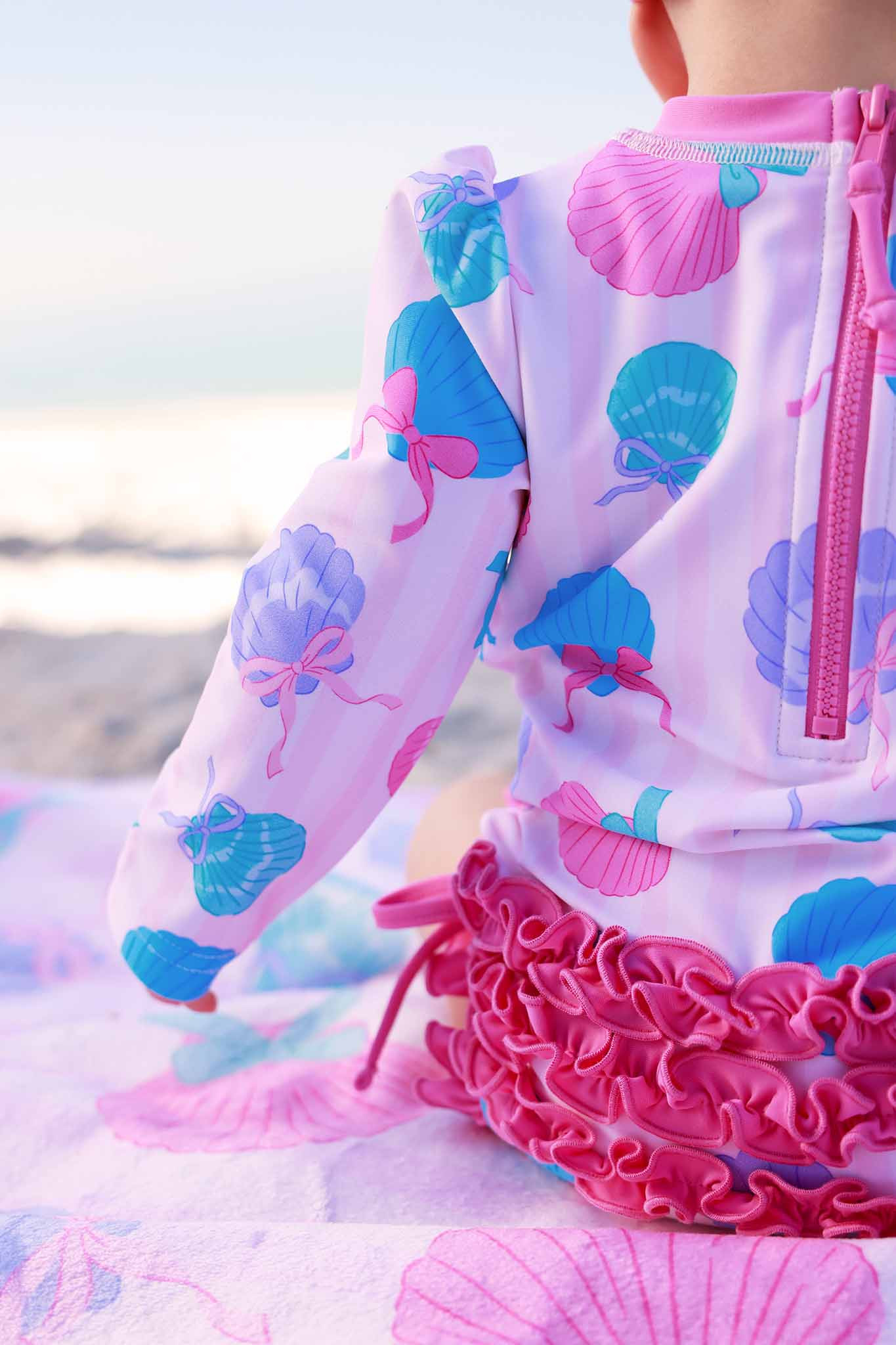 Long Sleeve Rash Guard With Ruffle Bottom | Seaside Sweetie | Caden Lane