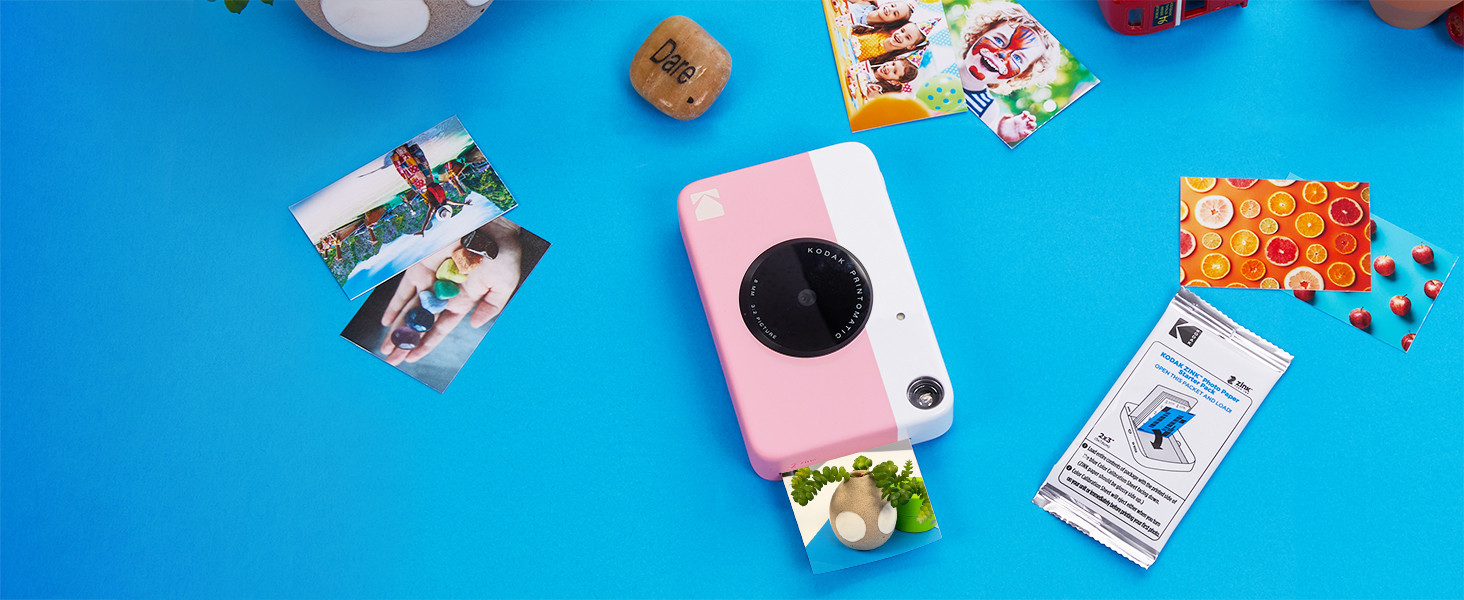 Kodak Printomatic Instant Camera (Pink) Gift Bundle + Zink Paper (20 Sheets) + Deluxe Case + 7 Fu... | Amazon (US)
