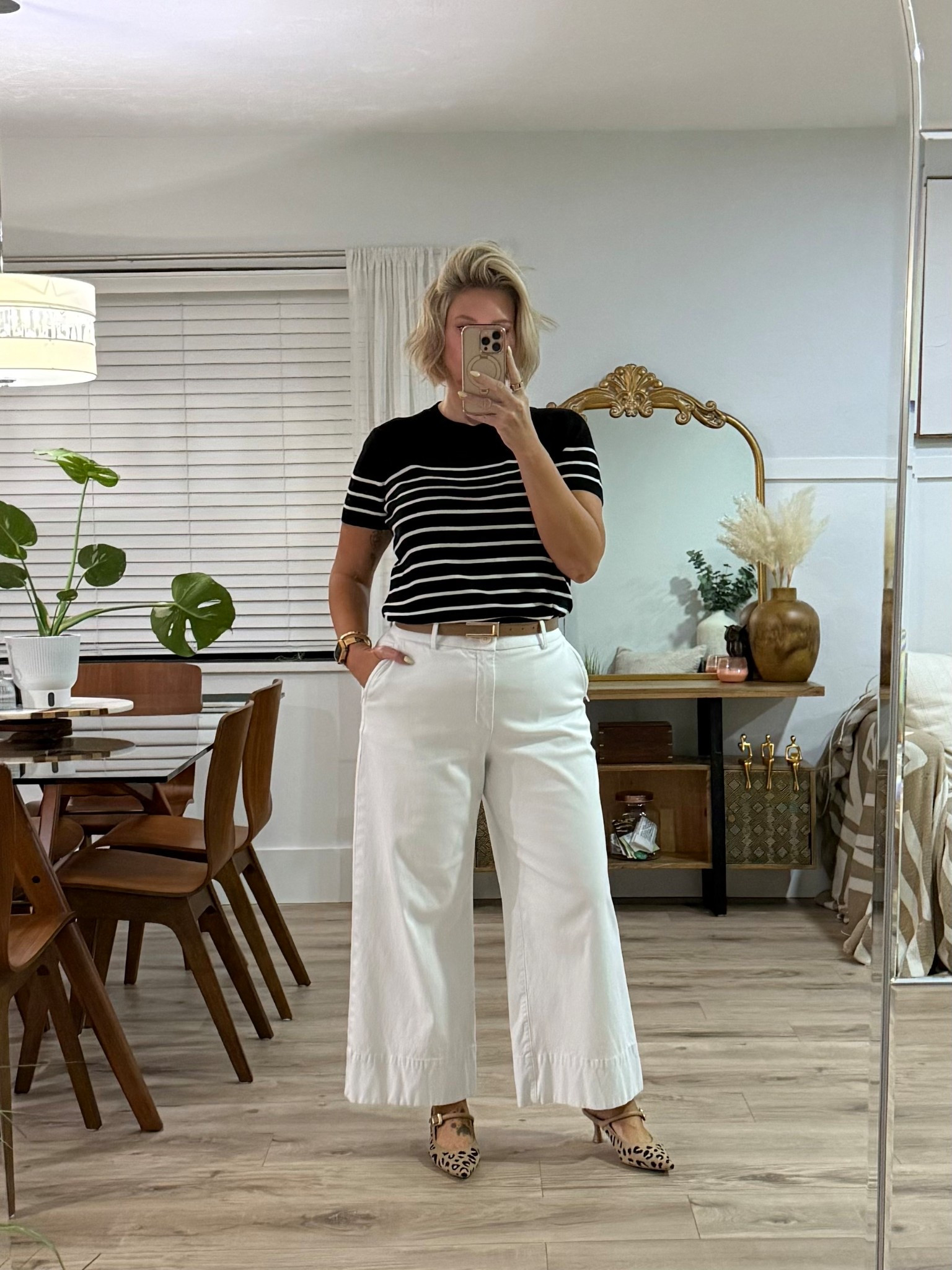 A black and white stripe is always a good idea!! 

This top is from Arach & Cloz on Amazon. I do recommend sizing down one. I’m wearing a medium. 

These are my favorite twill wide leg pants from Spanx. I’m wearing a large. 

My shoes are from Cosy Island and my belt is from Amazon. 

Watch: Amazon
Earrings: Walmart 
Ear cuff & bracelet: Melinda Maria use code LEEANN 10% off

Workwear, office outfit, workwear style, 

#LTKWorkwear #LTKStyleTip #LTKFindsUnder100