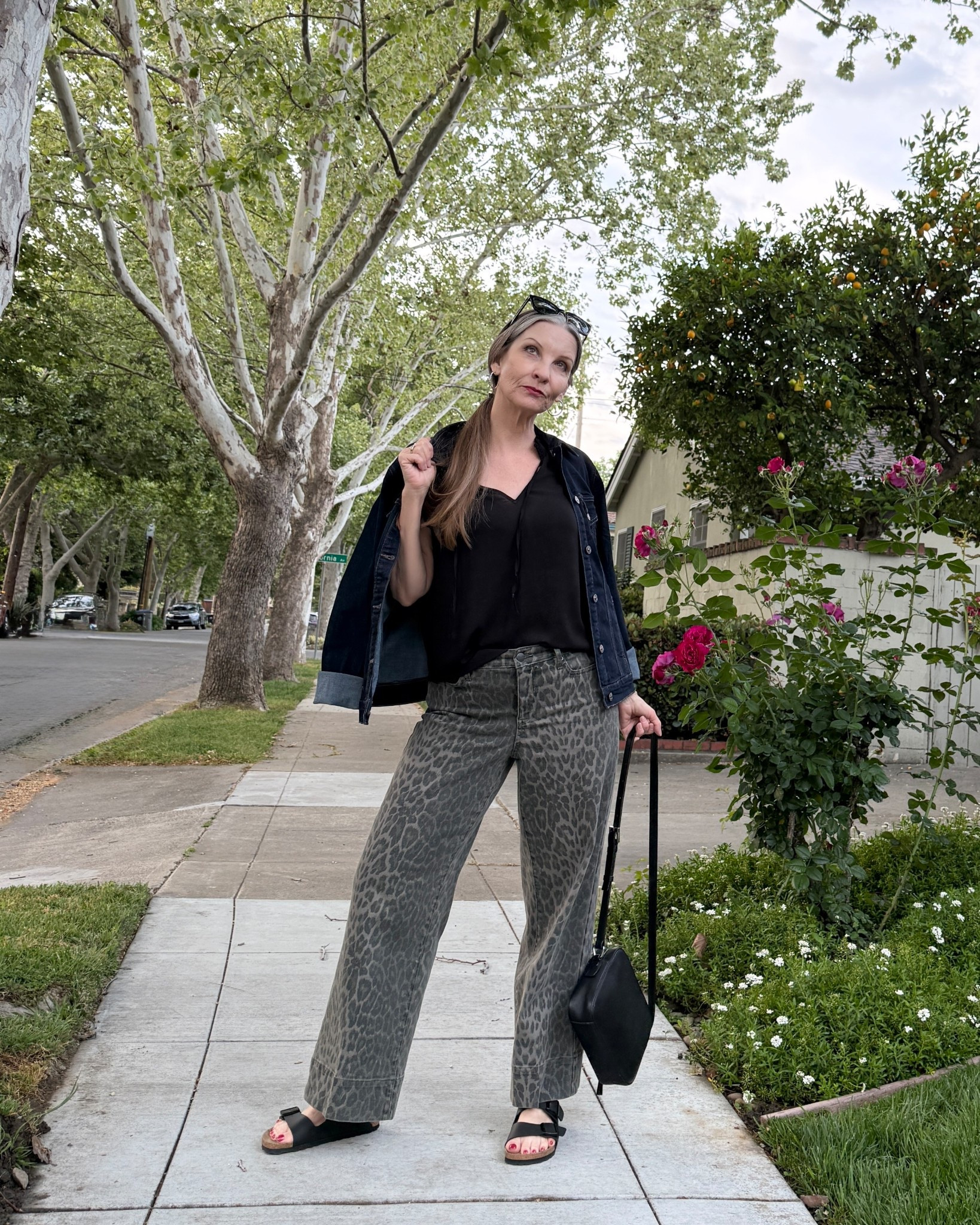 Styling these cool leopard jeans for spring. Size down one size in the jeans! #casualootd #leopardjeans #comfortablesandals #crossbody #denimjacket

#LTKootd #LTKMidsize #LTKOver40