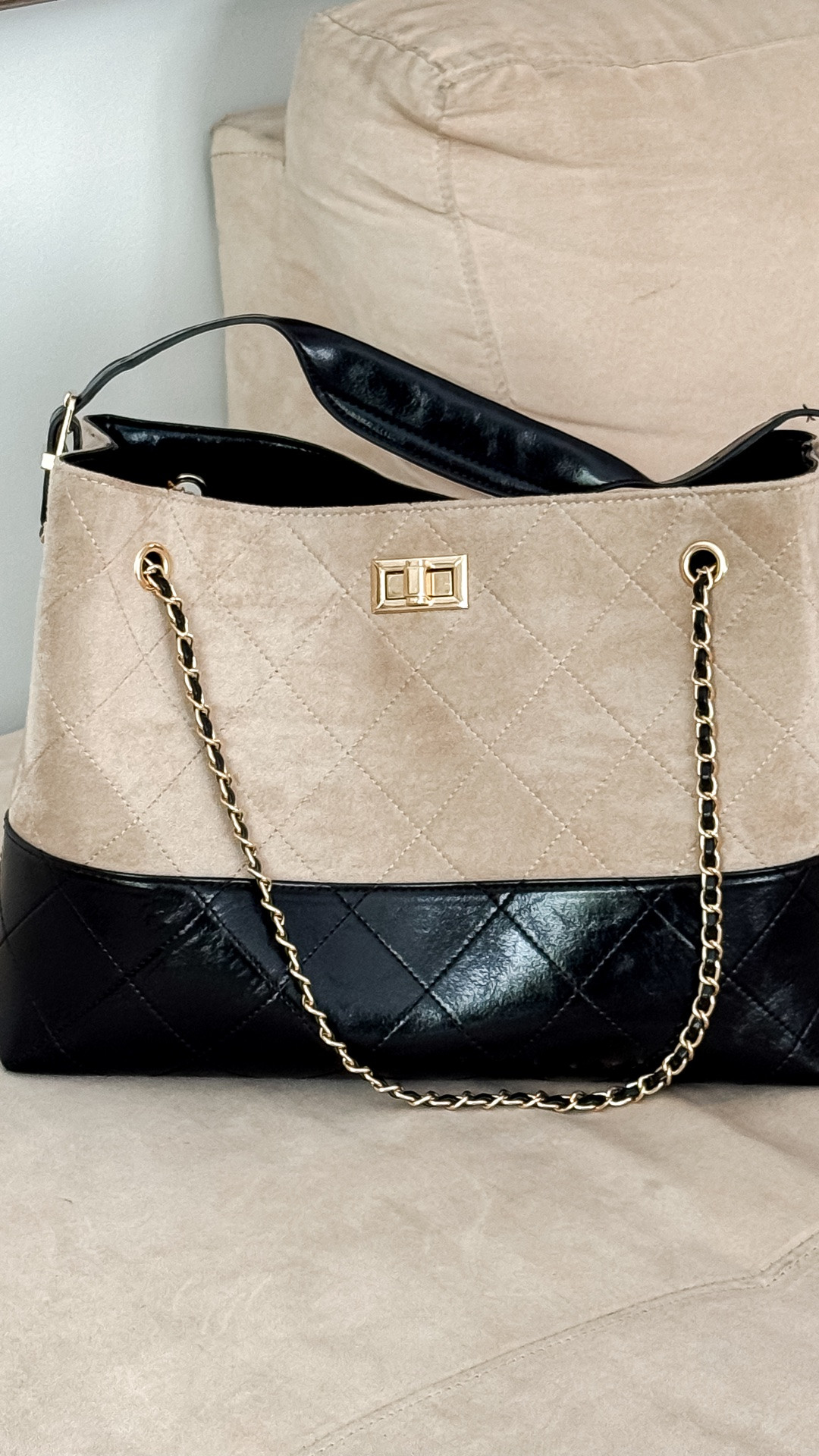 Neutral, chic, and giving quiet luxury vibes. This two-tone quilted tote is the kind of bag that instantly elevates every outfit. The black + cream combo with gold chain details makes it look designer-inspired without the designer price tag. Perfect for work, travel, errands, or your everyday “throw everything in and go” bag. Obsessed with how classy and versatile this one is! 

#LTKStyle #LTKItBag #NeutralStyle #QuietLuxuryStyle #EverydayBag #ToteBagStyle #FashionFinds #ChicStyle #AffordableLuxury #CapsuleWardrobe #StreetStyleFashion #MinimalStyle #DesignerInspired #BagObsession #OOTDInspo #ClassicStyle #ViralFashion #LTKUnder100 #ModernStyle #NeutralAesthetic #FashionInfluencer #TrendingNow #StyleInspo #LuxuryLookForLess #HandbagAddict

neutral tote bag • quilted tote bag • black and cream purse • designer inspired handbag • affordable luxury bag • everyday tote purse • chic work bag • trendy handbags 2026 • quiet luxury accessories • gold chain tote • neutral handbag outfit • classy tote bag • large everyday purse • modern fashion accessories • capsule wardrobe bag • stylish tote for women • urban expressions tote • eliana tote • minimalist handbag • work tote aesthetic @Urban Expressions

#LTKvlog #LTKTravel #LTKOver40