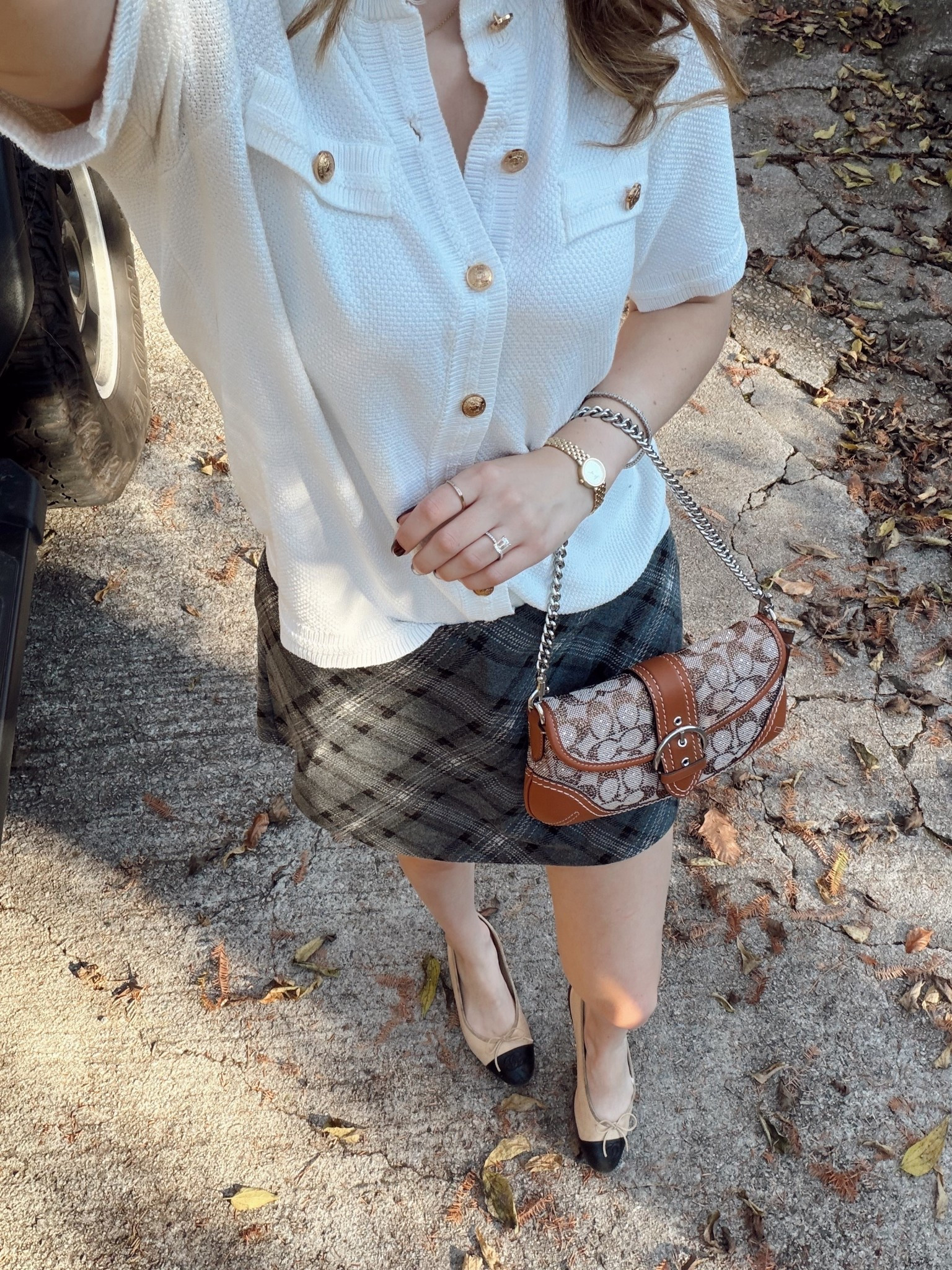 Outfit of the day ☑️ this cute plaid skirt has built in shorts and I have been wearing it on repeat! And it’s only $25

Wore it with my favorite Amazon button up sweater and coach crystal jacquard 

#LTKootd