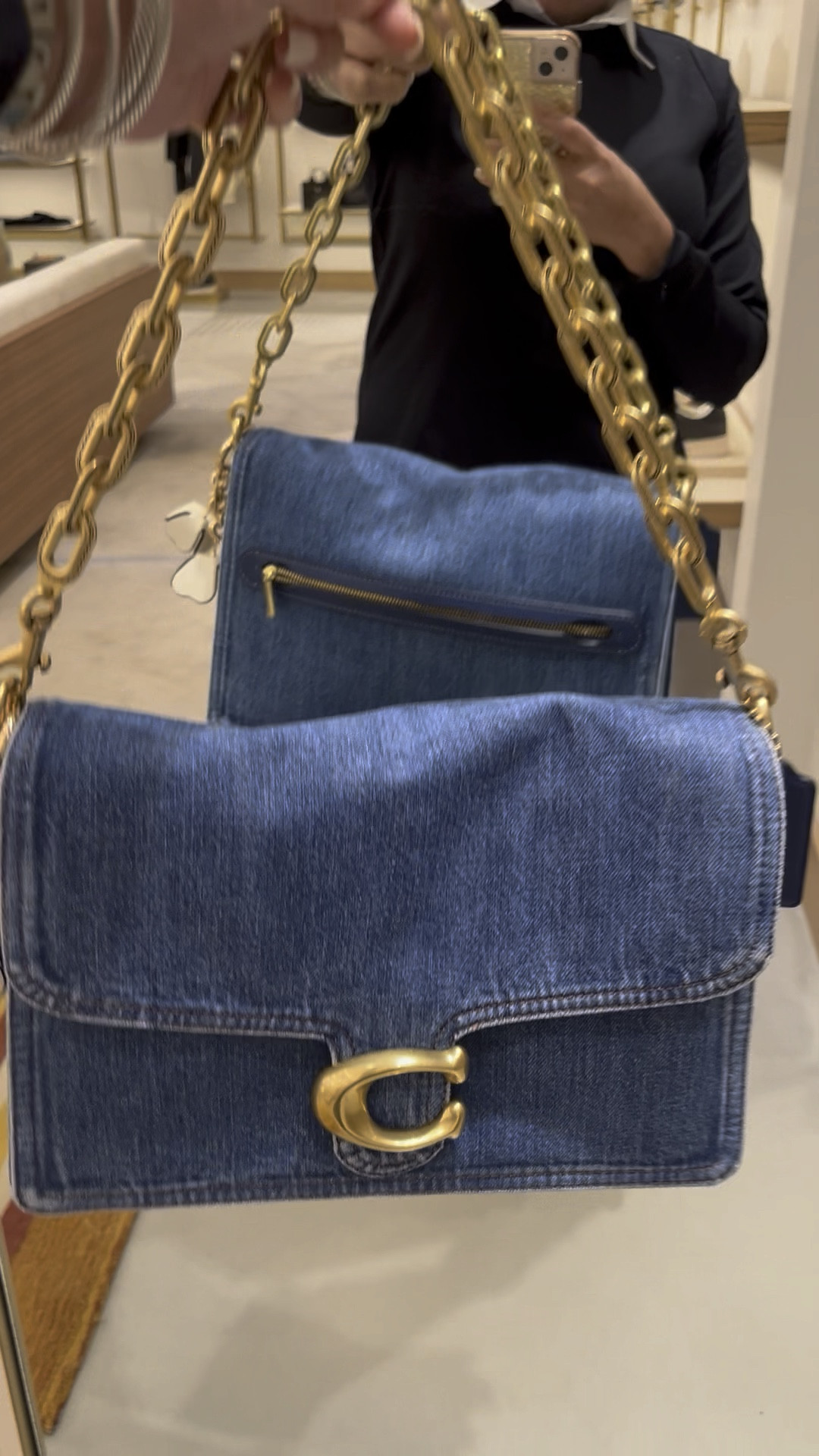This is the new denim chain tabby. This bag is in the size 30 and is a perfect lightweight spring bag to add to your collection.

#LTKSeasonal #LTKItBag #LTKWorkwear