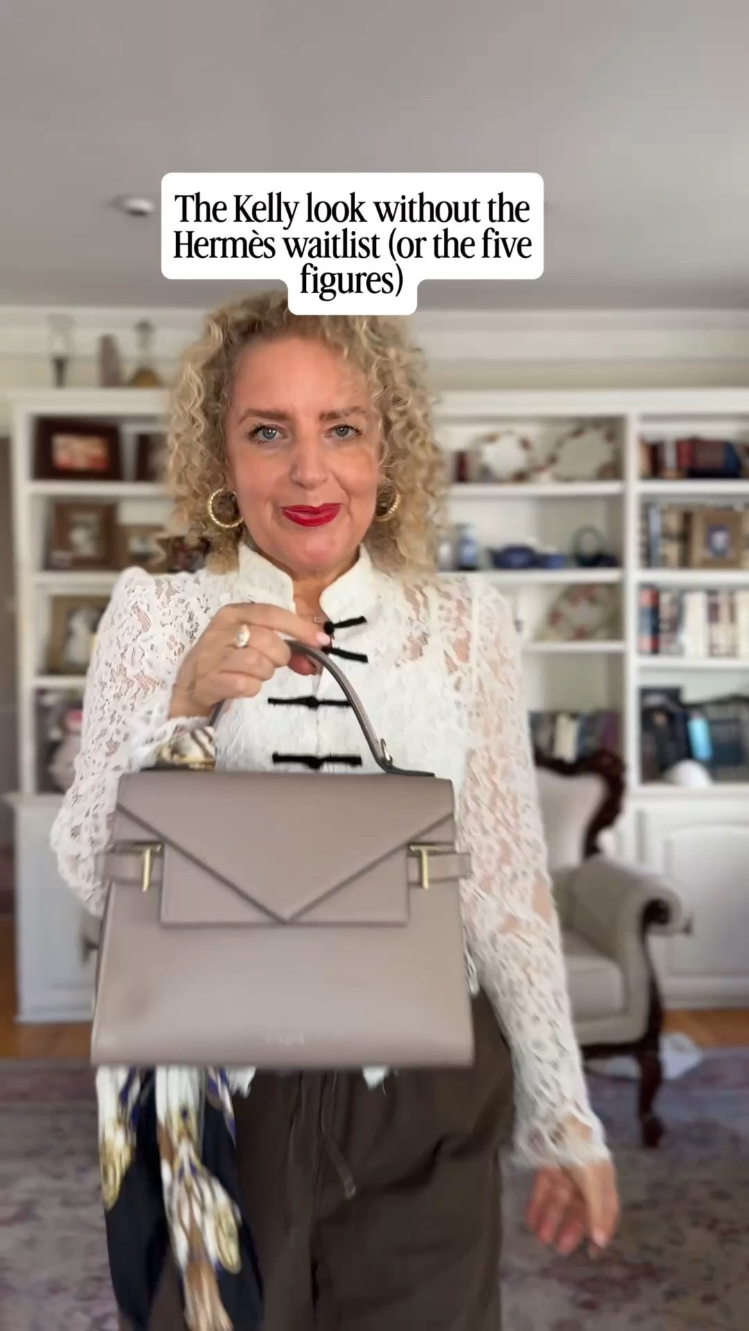 Structured top handle bag in taupe. French leather, gold hardware, and the Kelly-style silhouette I’ve wanted forever, without the five-figure price. Styled with a silk scarf on the handle, a lace blouse, and olive wide-leg pants.

#LTKootd #LTKOver40 #LTKWorkwear