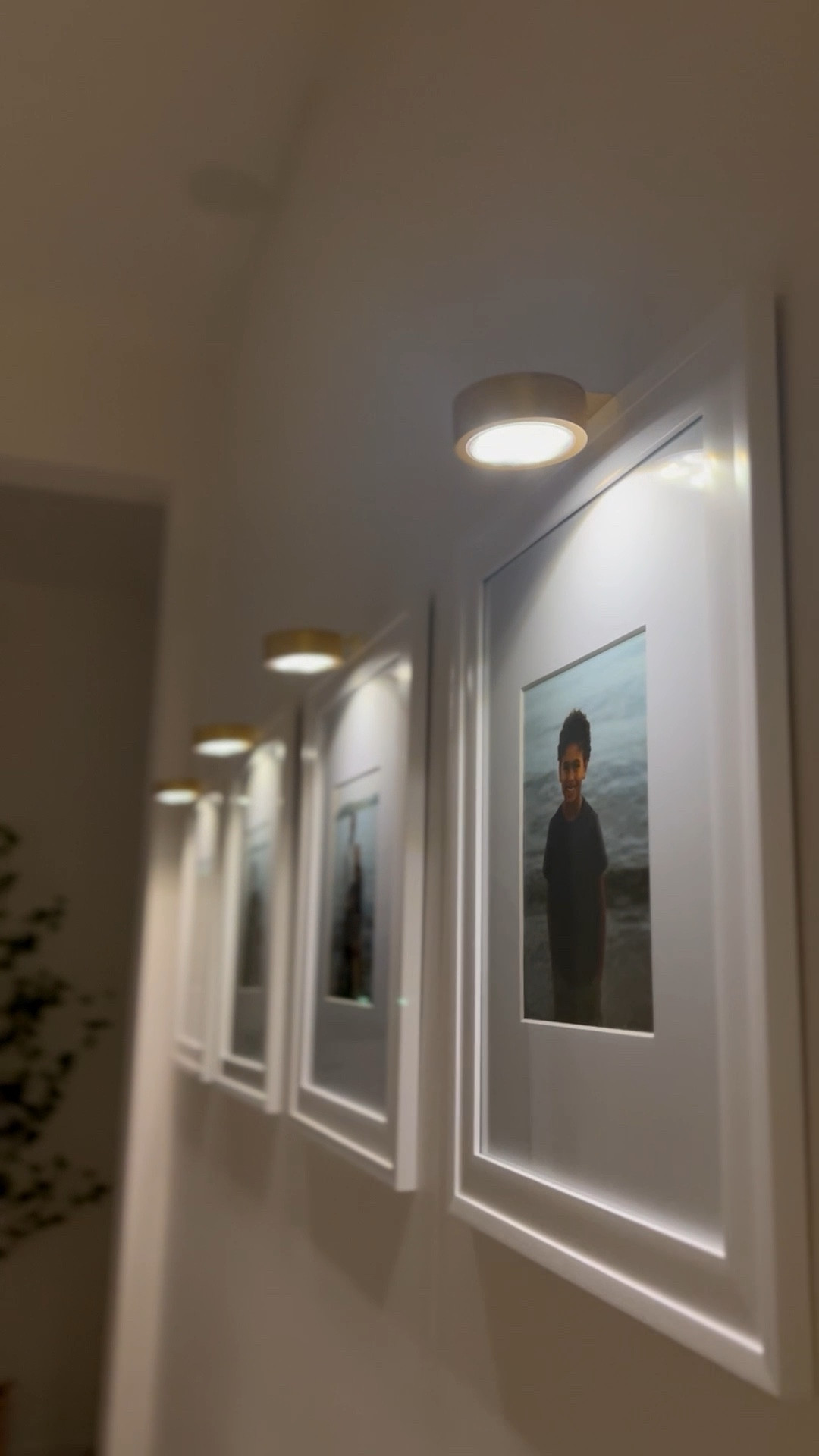 Easy way to elevate your house…. Picture lighting 💡 turn a dark hallway into a high end space. Battery operated and super easy to set up. 

#LTKHome