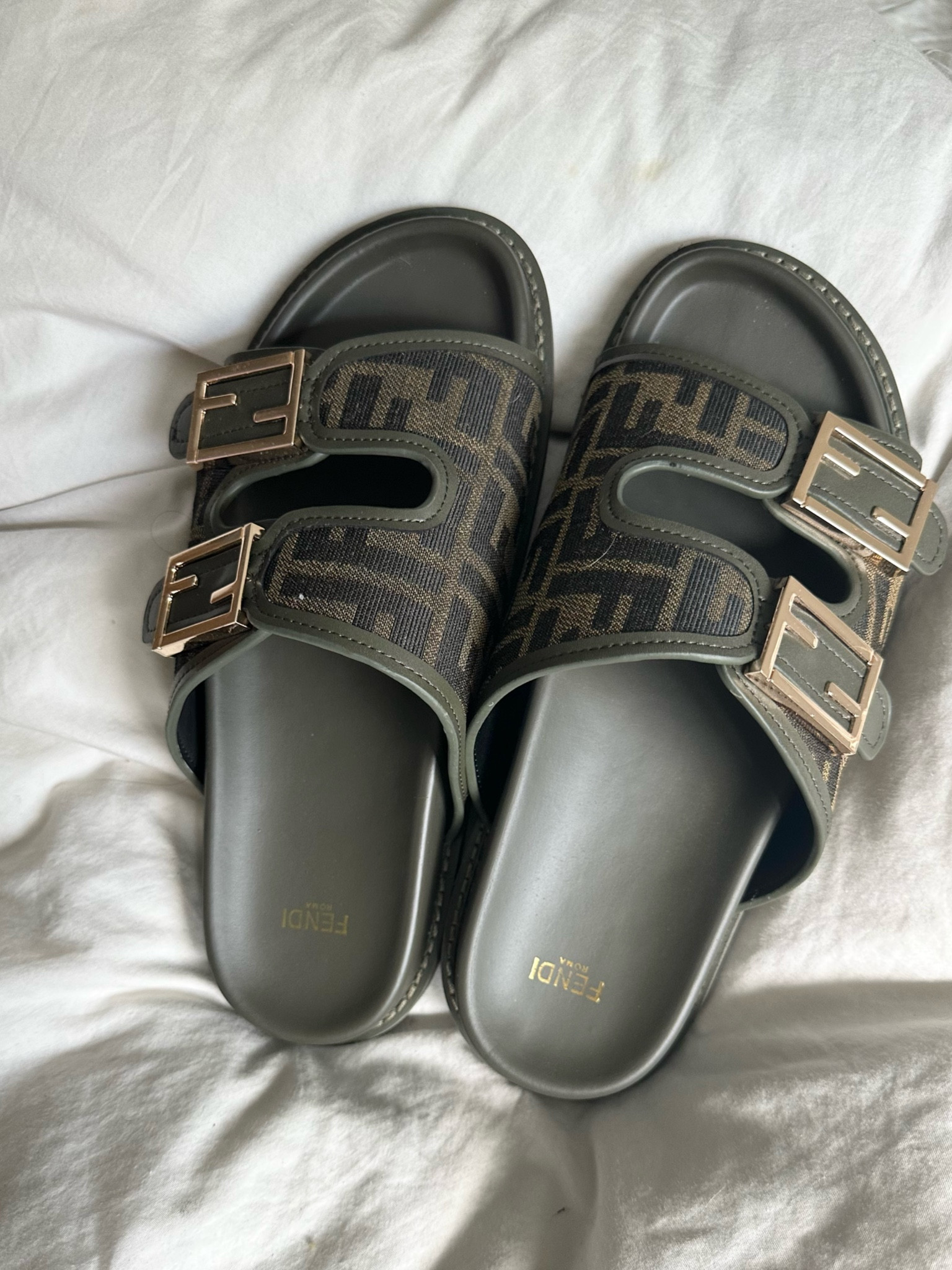 OLIVE GREEN FENDI SLIDES 1:1

#LTKSeasonal #LTKFind #LTKshoecrush