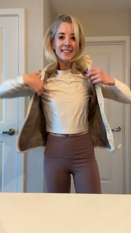 Hey there! I just snagged this adorable “Women’s Long Sleeve Mock Neck T-Shirt” by Wild Fable (Target). The color I chose is, “Light Beige.”

I love this long sleeve mock neck top in Size Medium from Target! I wore it on my morning dog walk with the Cavaliers, & I have some style tips for you! 😊

I'm usually an XS/S, but this top is super fitted and cropped, and shows a bit of midriff, even when I took 2 sizes up.

Here's my sizing advice: If you want to flaunt your midriff, stick to your regular size. But if you're like me and prefer a bit more coverage, consider going up a size or even three.

Now, let's talk styling! For workouts, gym sessions, or dog walks, pair it with high-waisted tummy control leggings like these 90 Degree ones (available on Amazon). They're a game-changer. If you're heading to work or a date, opt for high-rise pants or jeans to accentuate your waistline – it's so flattering!

🍂 🤍 Oh, and here's the bonus: This top has a subtle shine, almost like a metallic touch. Perfect for adding some glamour to your look. 

Happy shopping, everyone! 💁‍♀️

#LTKGiftGuide #LTKVideo #LTKstyletip