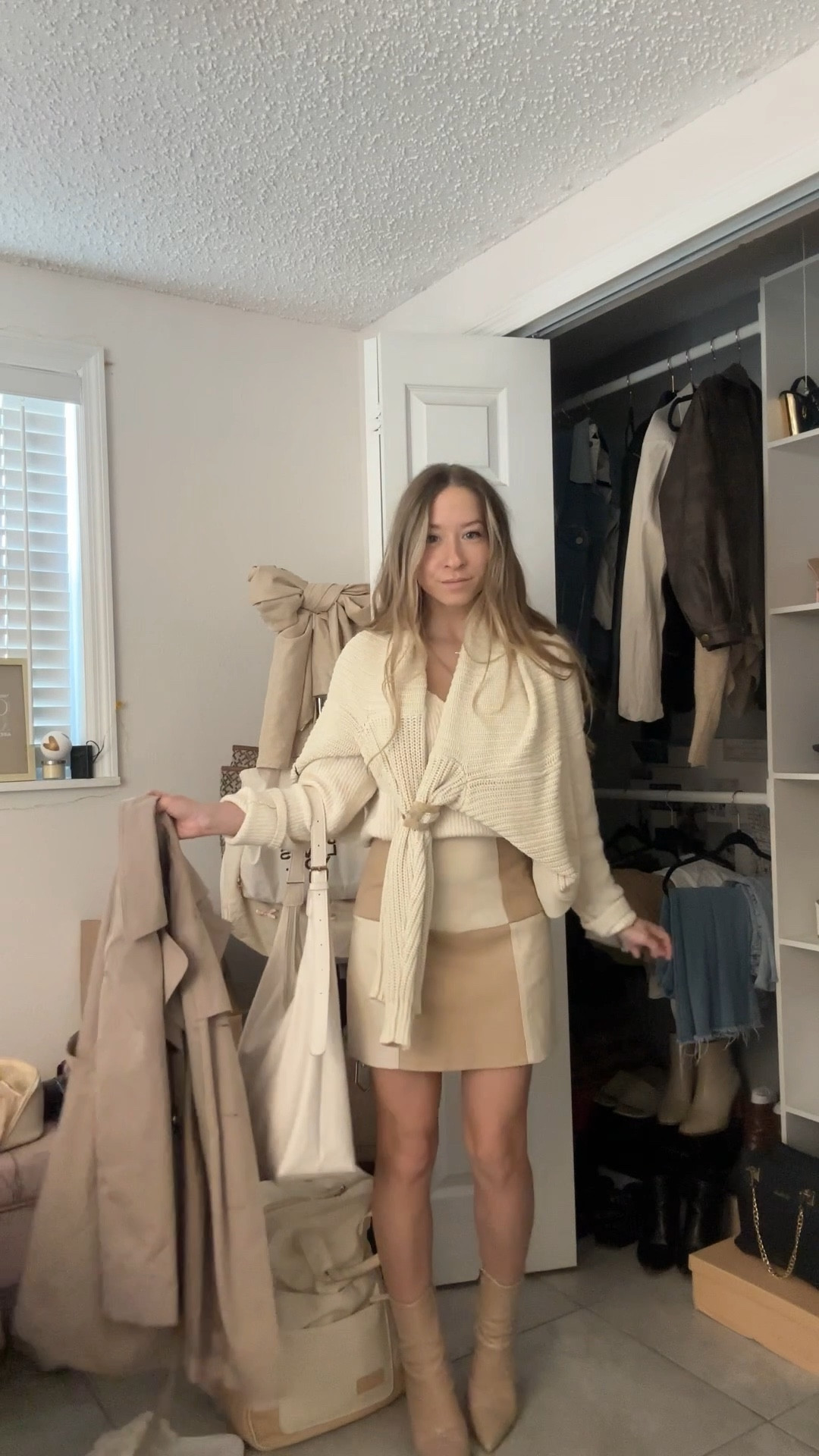 neutral beige and pink mini skirt outfit🤍 layered a cardigan as a scarf and topped with a trench coat! everything linked🫶🏻

#LTKSeasonal #LTKootd