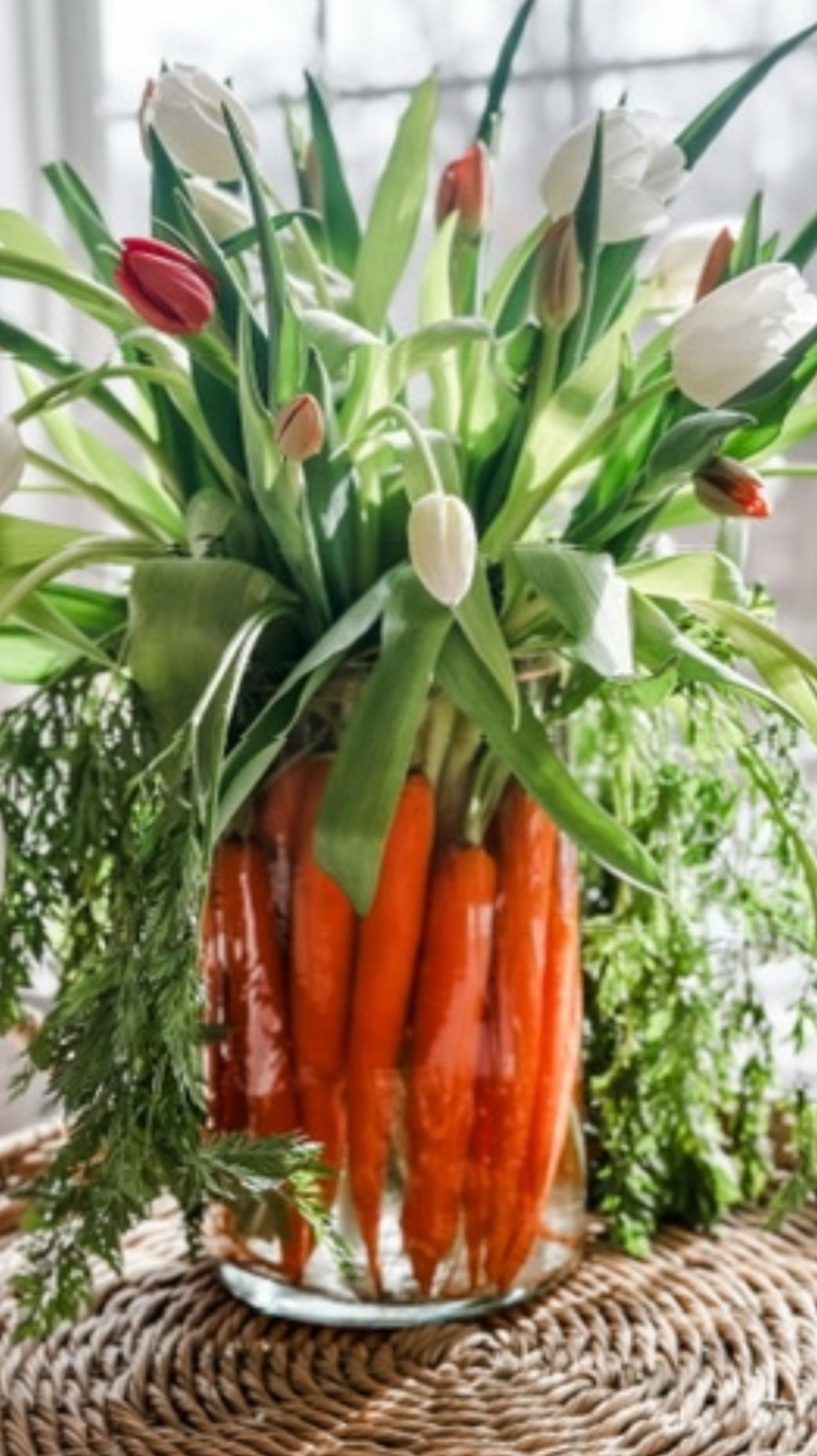 Carrot and Tulip Centerpiece 🥕is truly a garden-inspired arrangement! Elevate your Easter table with a sophisticated floral centerpiece that seamlessly blends the beauty of nature indoors! Delight your guests with vibrant tulips and playful carrot stems in a clear vase—a whimsical and elegant touch that captures the spirit of the Spring season. 


#LTKParties #LTKStyleTip #LTKHome