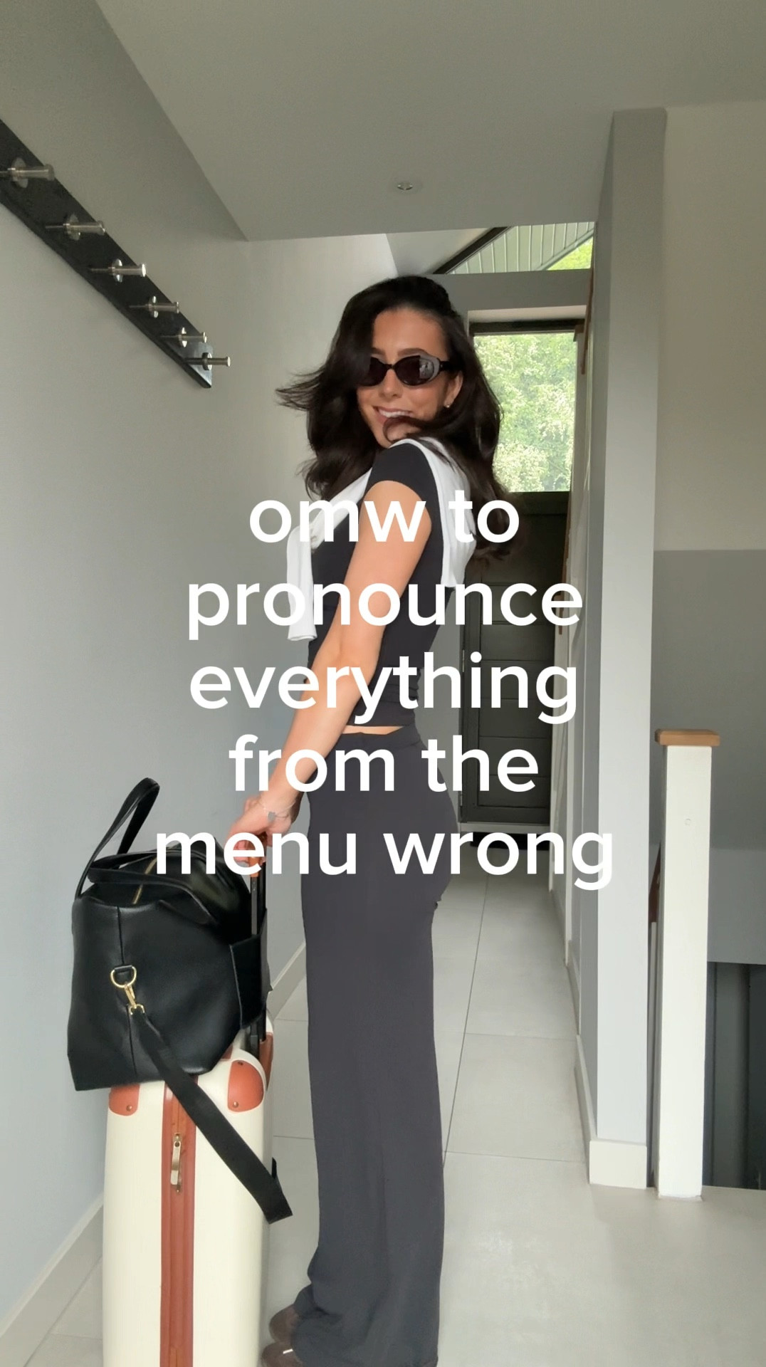 What I’m wearing to the airport ✈️ I wear size small in the trousers (rolled down) small in the top - suitcase is from The GO-TO. Spring outfits, airport outfits, spring fashion, soft motion trousers 

#LTKTravel #LTKootd #LTKSeasonal