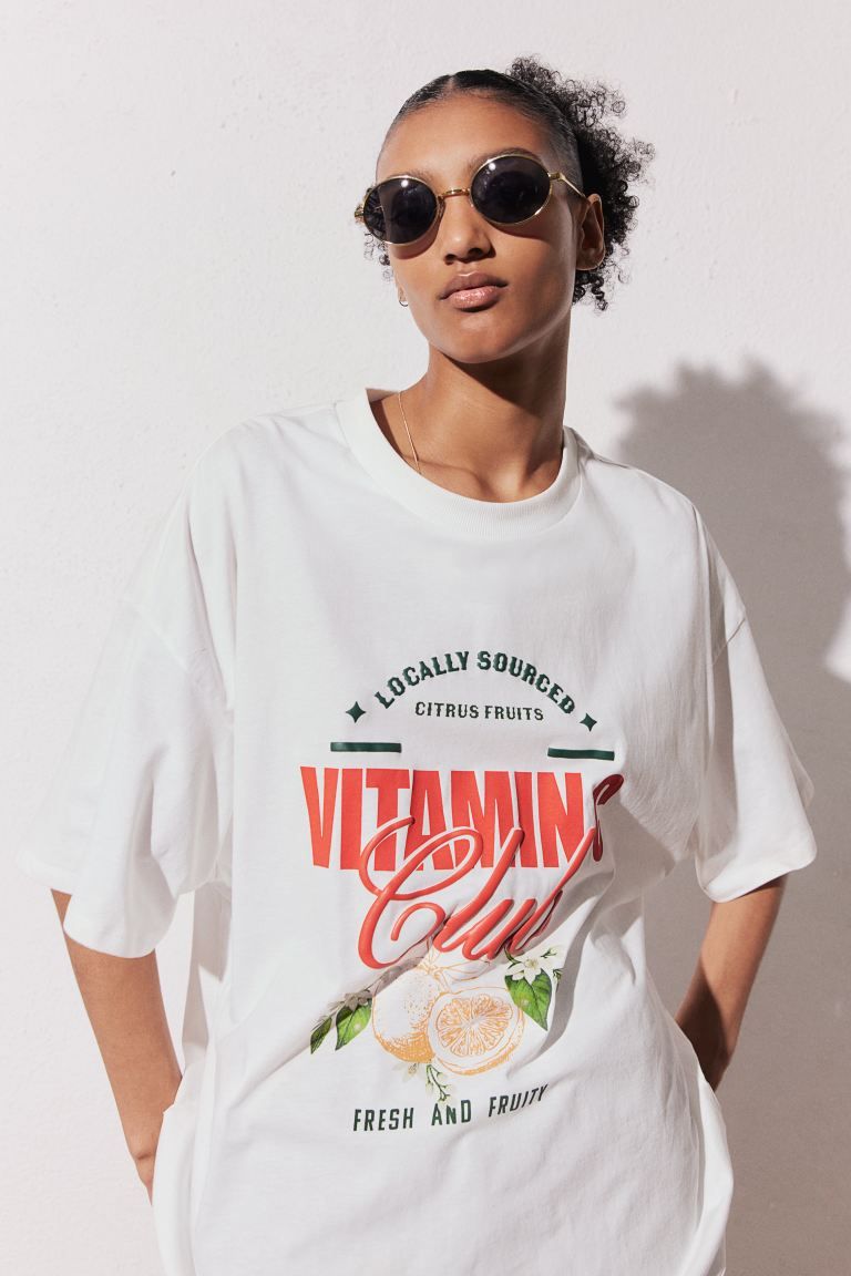 Oversized motif-detail T-shirt - Round neck - Short sleeve - White/Vitamin C - Ladies | H&M GB | H&M (UK, MY, IN, SG, PH, TW, HK)