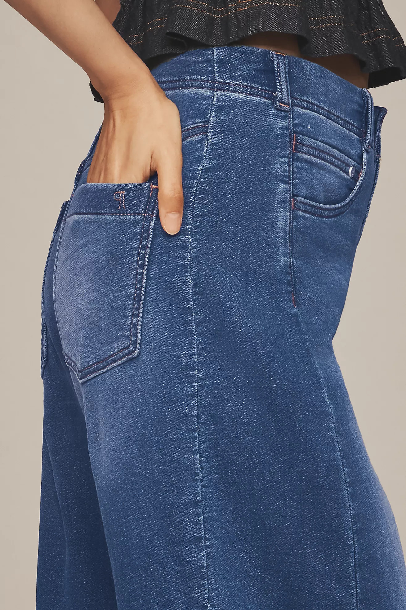 The Adi Knit Mid-Rise Flare Jeans by Pilcro | Anthropologie (US)