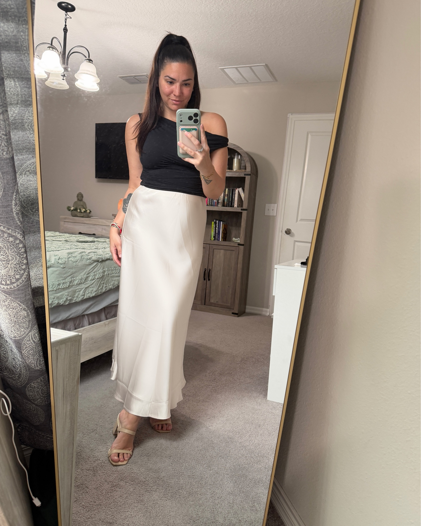 Minimal and timeless but a big impact! An easy elevated look with a silky midi skirt and asymmetrical classic black tank. Perfect for date night, brunch, or when you want to feel put together without trying too hard🤍🖤 #DateNight #GNO 

#LTKstyletip #LTKshoecrush #LTKSeasonal