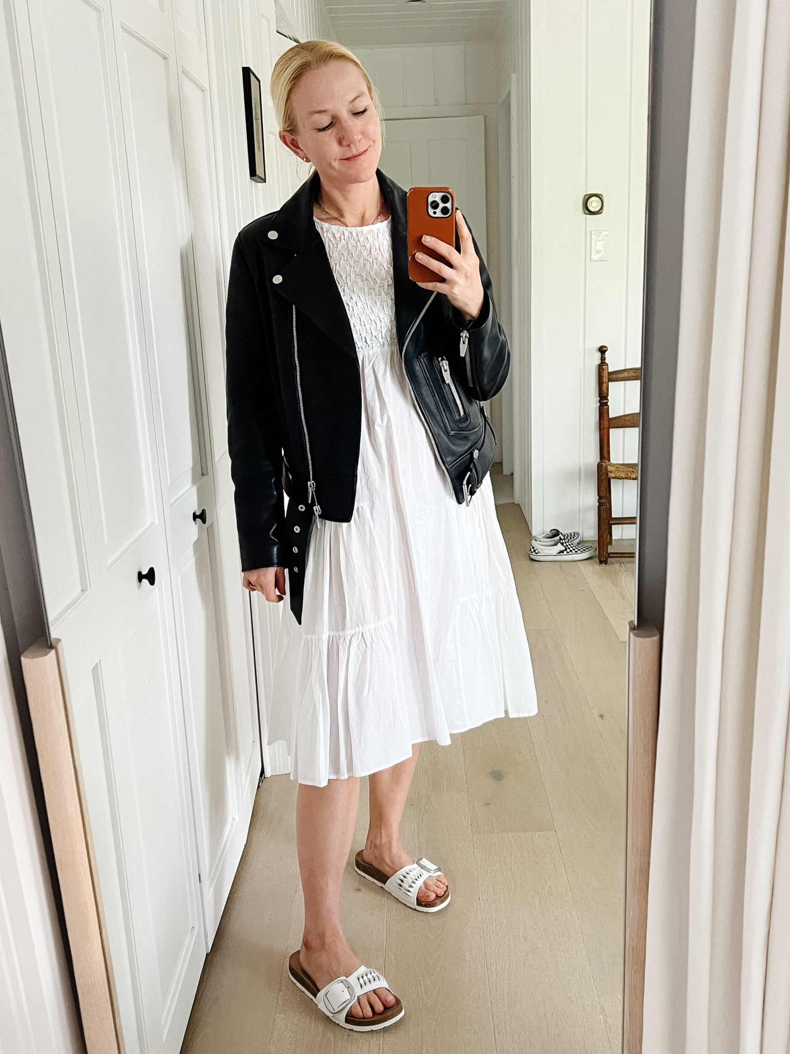Love the contrast of a tiered white dress with a tough black leather jacket! The perfect summer outfit for date night, just throw the jacket over your shoulders when the sun goes down! #summerstyle #minimaliststyle #leatherjacket

#LTKfit #LTKSeasonal #LTKstyletip