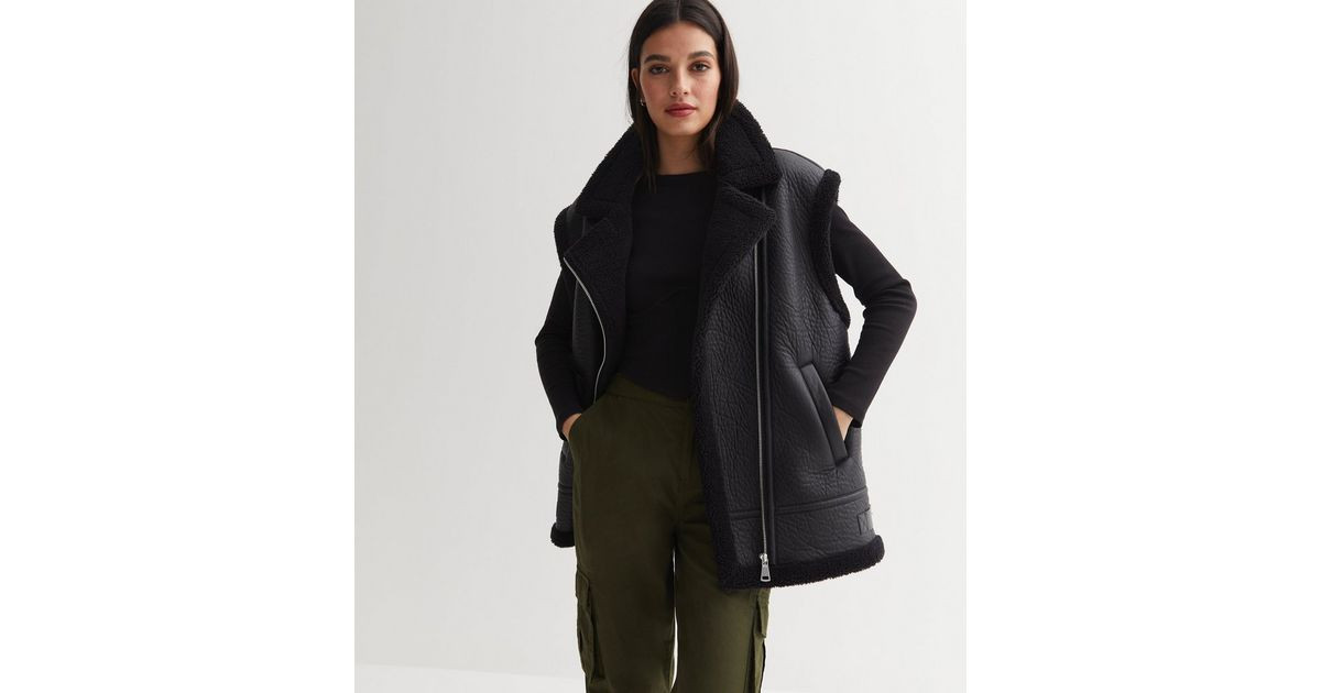 Black Leather-Look Faux Fur Collared Gilet
						
						Add to Saved Items
						Remove from Save... | New Look (UK)