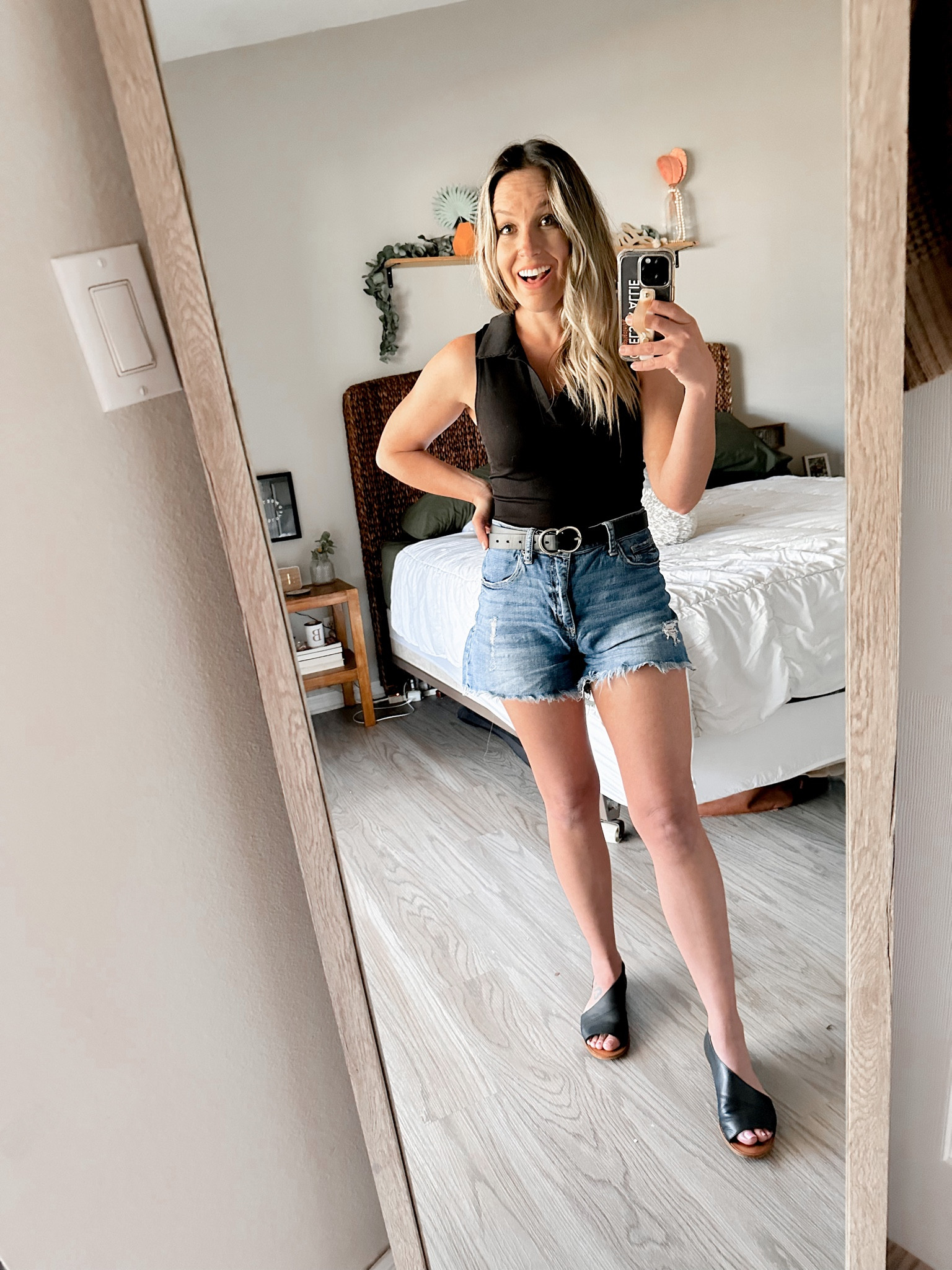 Black collar crop top
Frayed denim short 
Black and gold belt 
Black side cut flats 

#LTKFind #LTKshoecrush #LTKstyletip