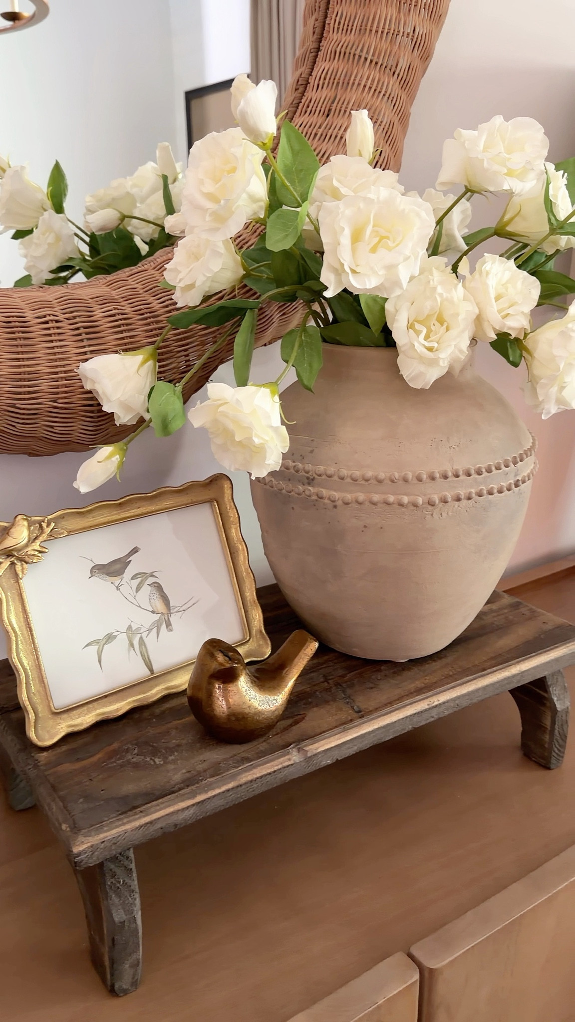 Sometimes you just need a riser to elevate you decor for instant height. Unfortunately mine has sold out but no worries, I will link some that are similar. I added a beautiful arrangement with real touch roses, a small piece of art and a golden bird. Such a beautiful look for countertops, entryway tables, sideboard or even a dresser. This is a look you can use almost anywhere  