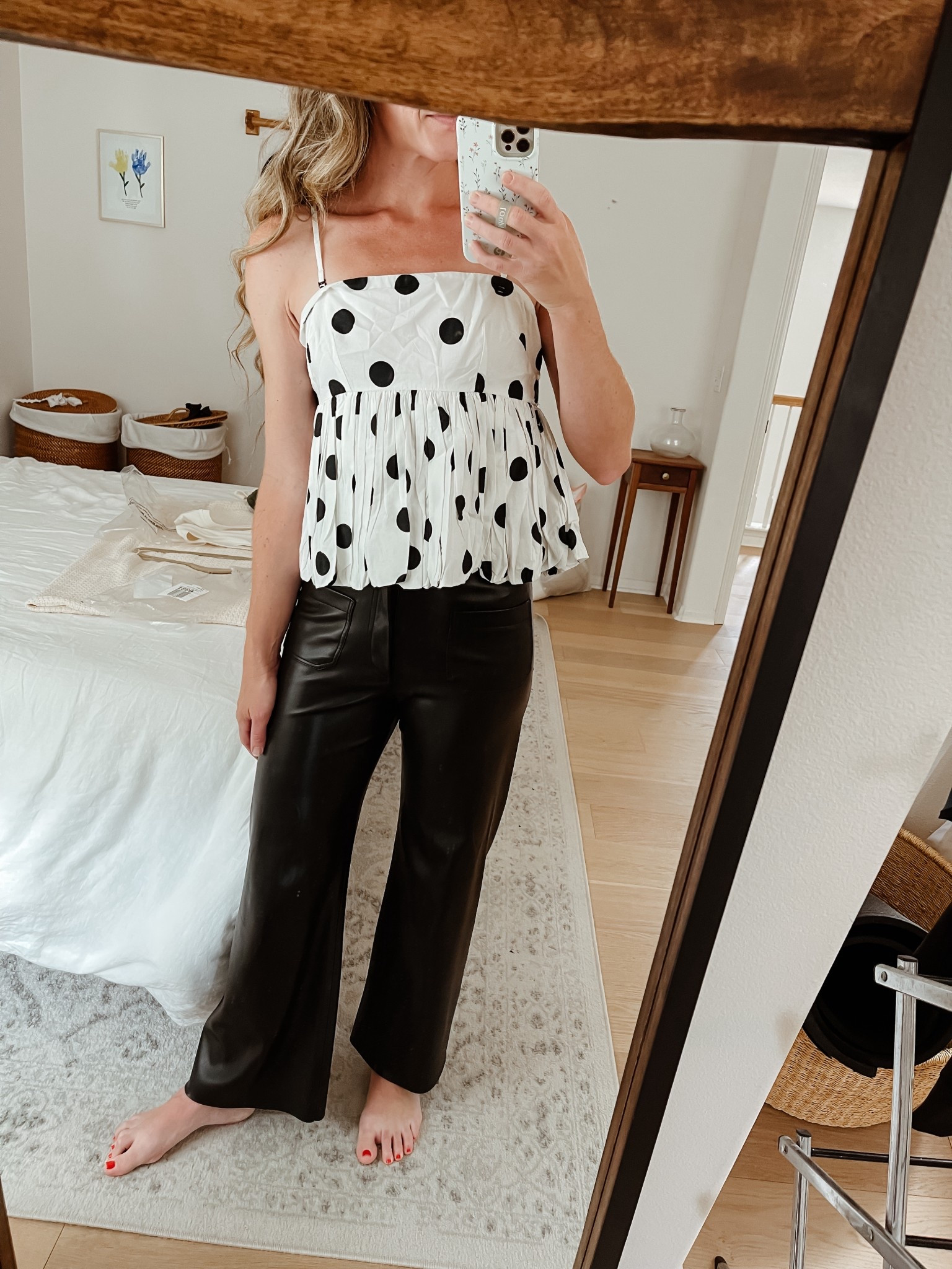 Anthropologie Bubble hem top in polka dots. Can be worn with or without straps. Runs slightly big in the bust, wearing a small. 

#LTKOver40 #LTKFindsUnder100