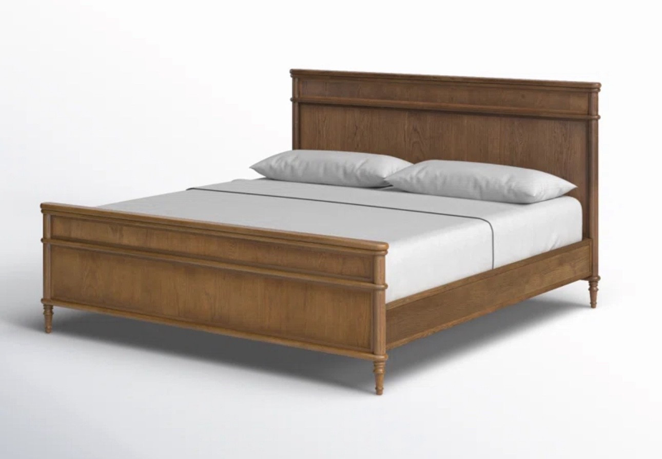 Loving this medium toned wood bed frame. Clean lines and beautiful details.

#LTKHome