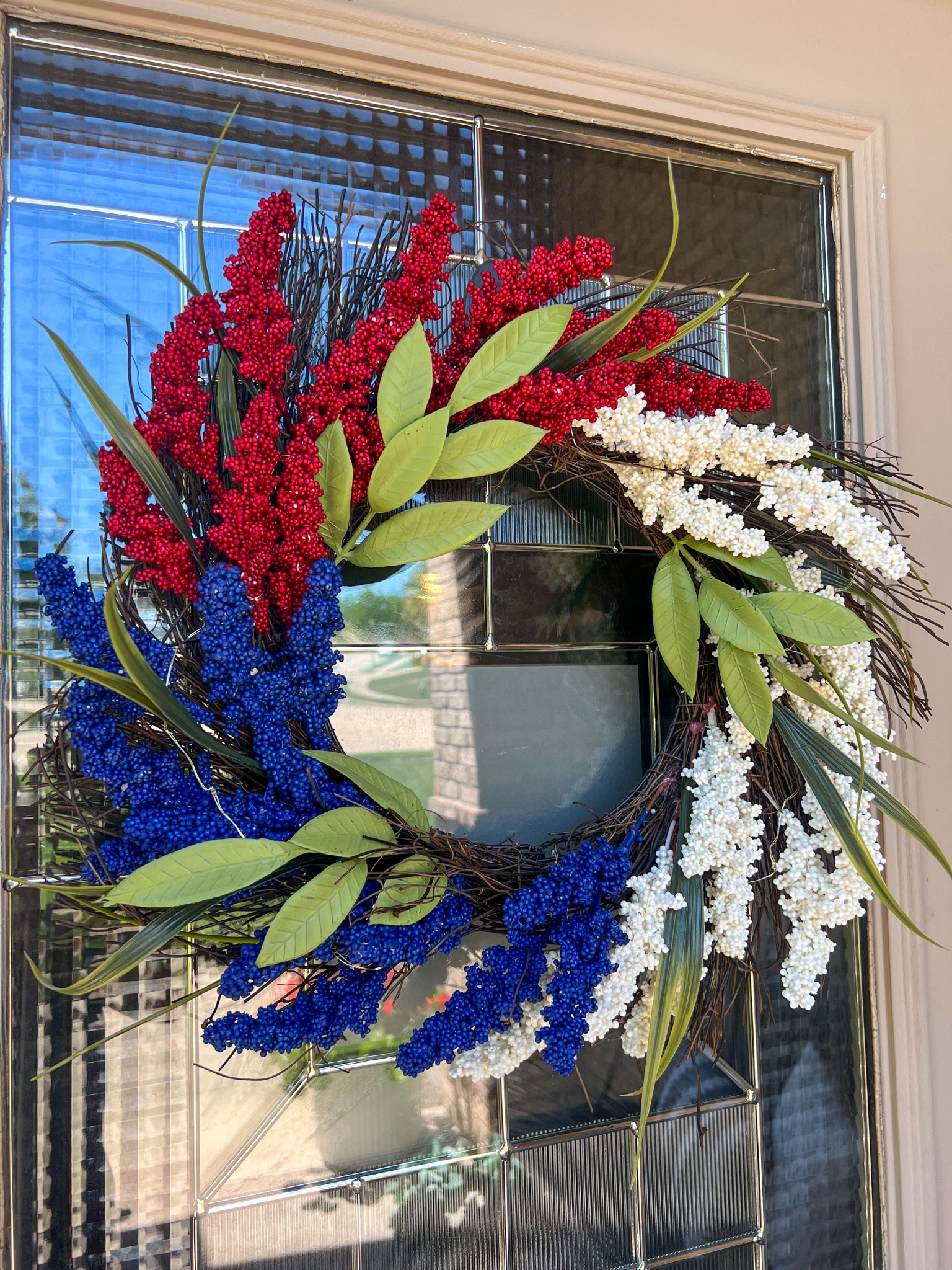 Patriotic Outdoor Wreath! I think this is so gorgeous and it lights up in the evening. It has an on/off switch with a timer! So pretty for the 4th of July #outdoorwreath #frontporchdecor #usadecor greenerywreath#floralwreath

#LTKFindsUnder50 #LTKSeasonal #LTKHome