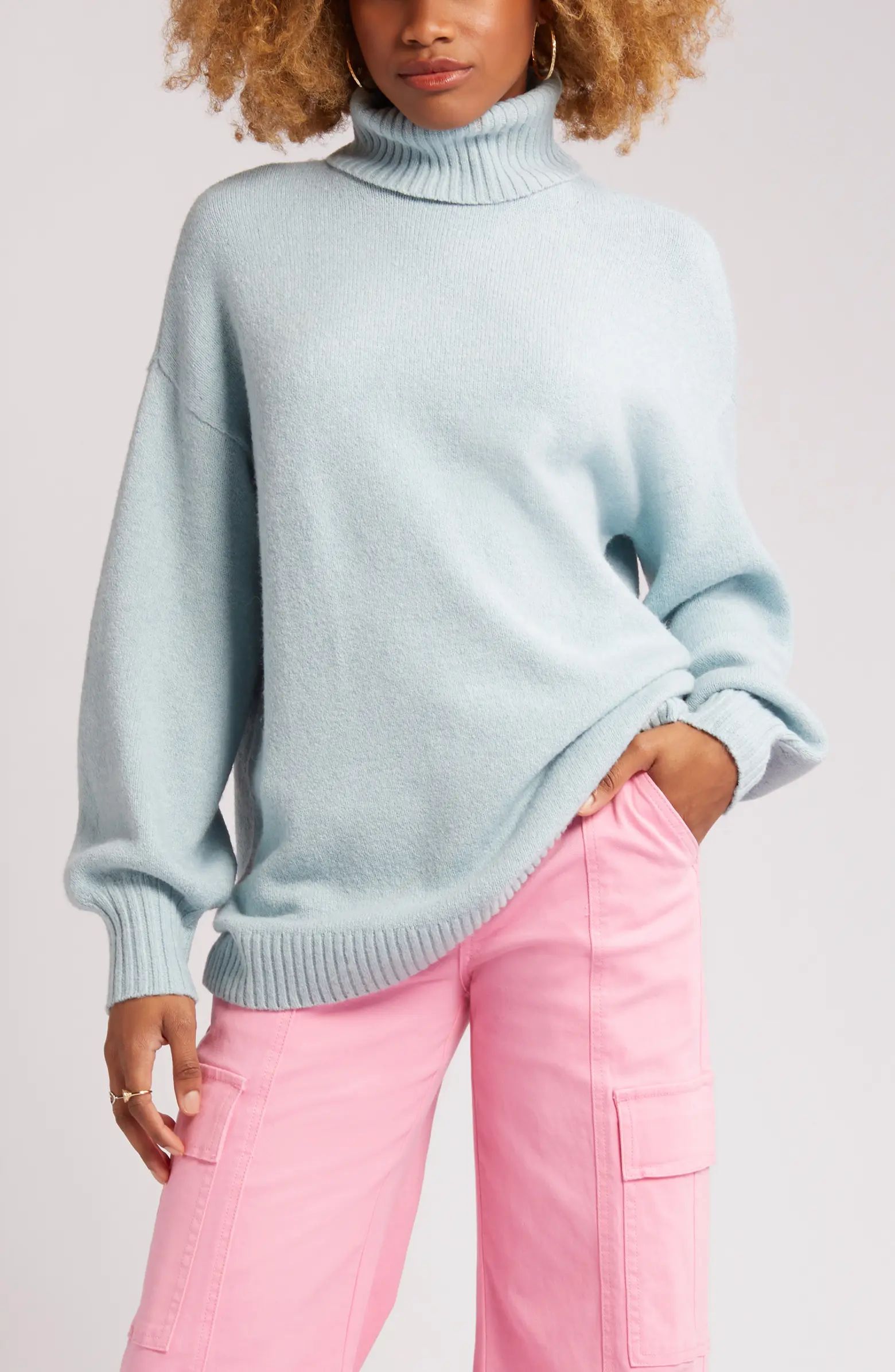 Lightweight yet supercozy, this rib-trimmed turtleneck sweater is made with recycled fibers and a... | Nordstrom