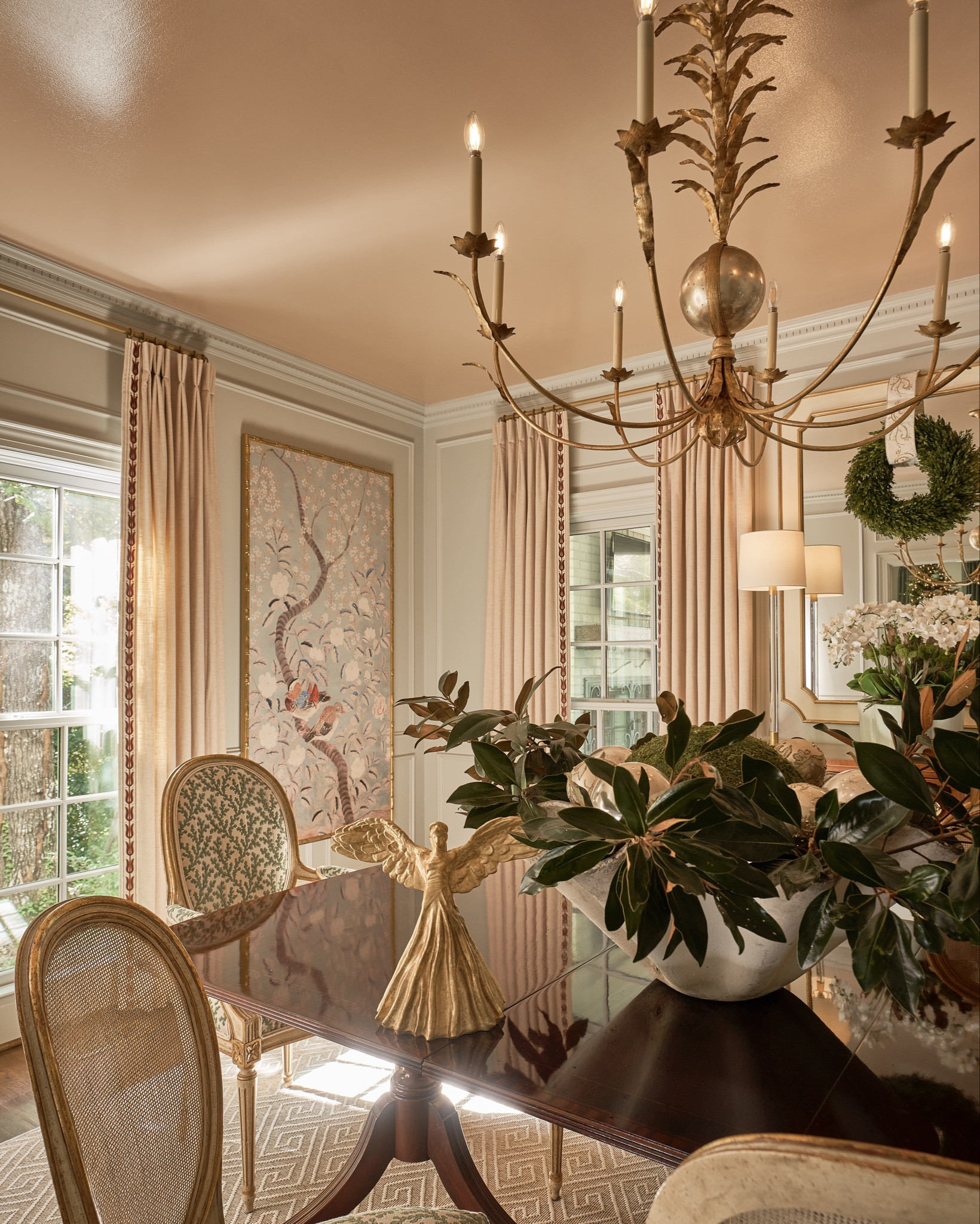 Christmas glamour! From gold angels, boxwood wreaths and magnolia leaves, I love the way this simple holiday look emphasizes my dining room decor  

#LTKHome #LTKHoliday