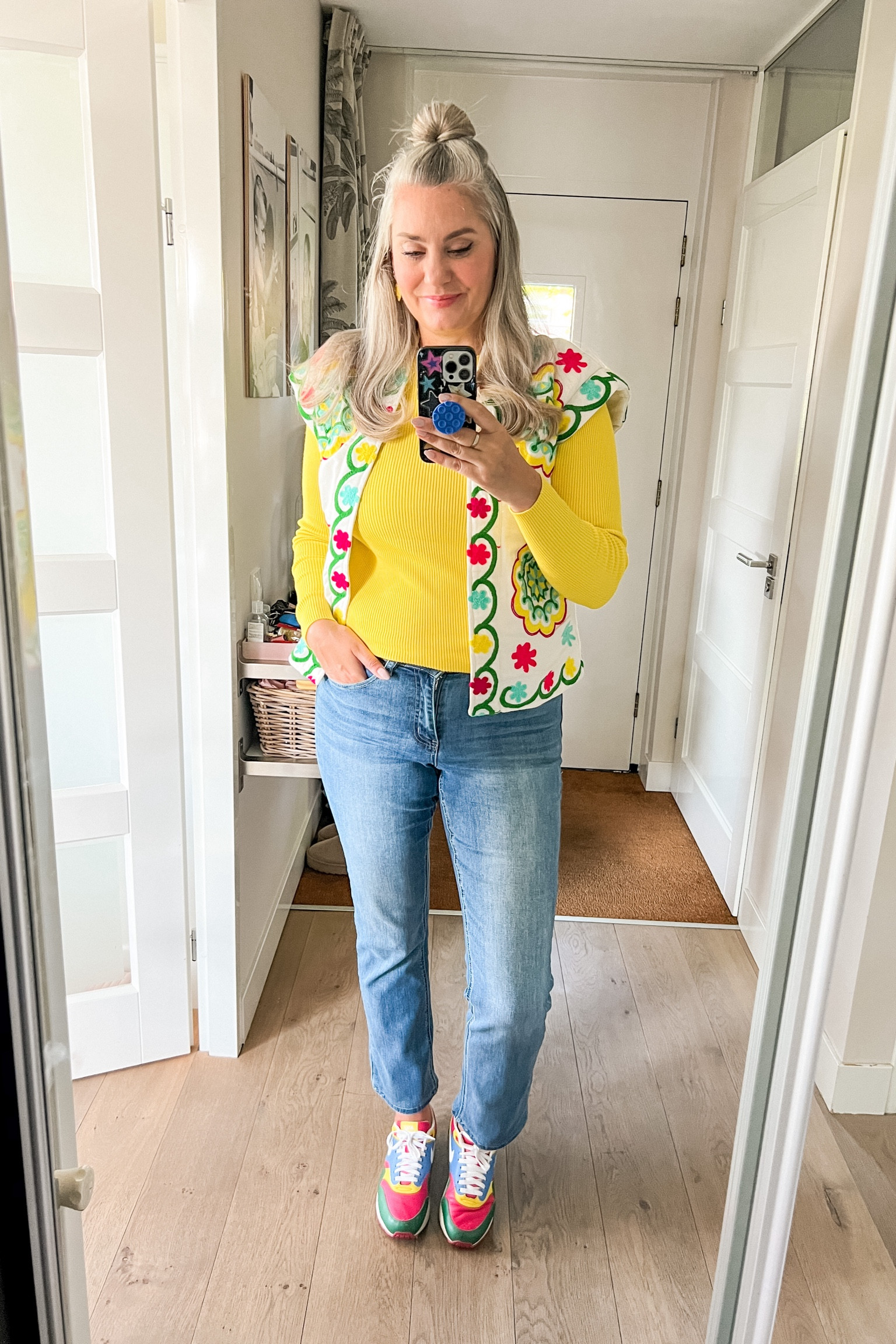 Ootd - Thursday. Yellow knit top (Hema), the best straight stretch jeans (sustainable option), a bright embroidered gilet (local boutique) and custom Nike ID’s (over 15 years old).

#LTKeurope #LTKnederlands #LTKstyletip