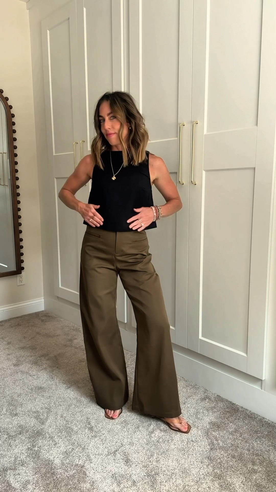 Perfect work outfit!
Olive trouser pants - fit TTS 
Black linen top: size up one 
**