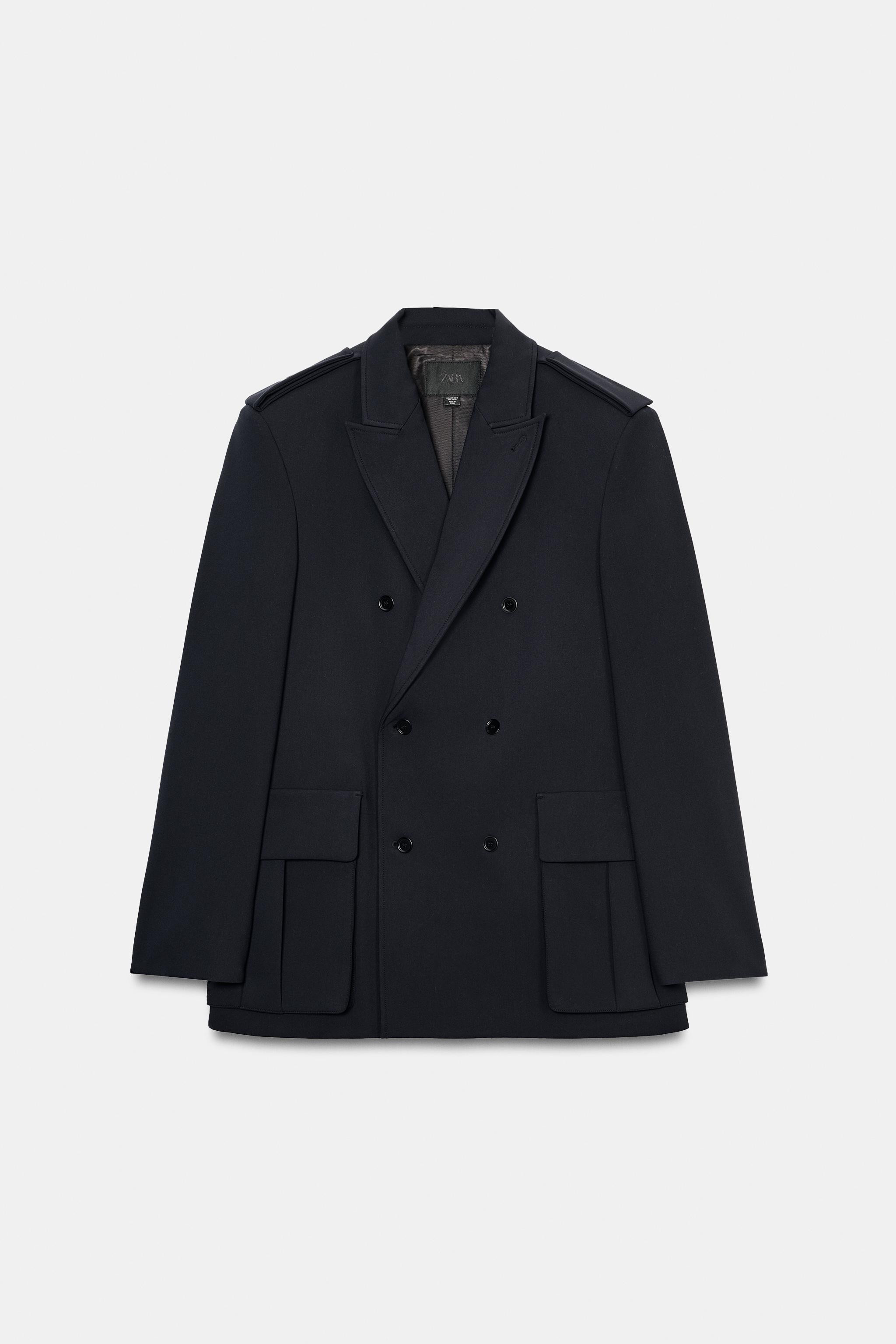 Oversized blazer with lapel collar. Long sleeves with shoulder pads and tab. Front patch pockets ... | Zara US